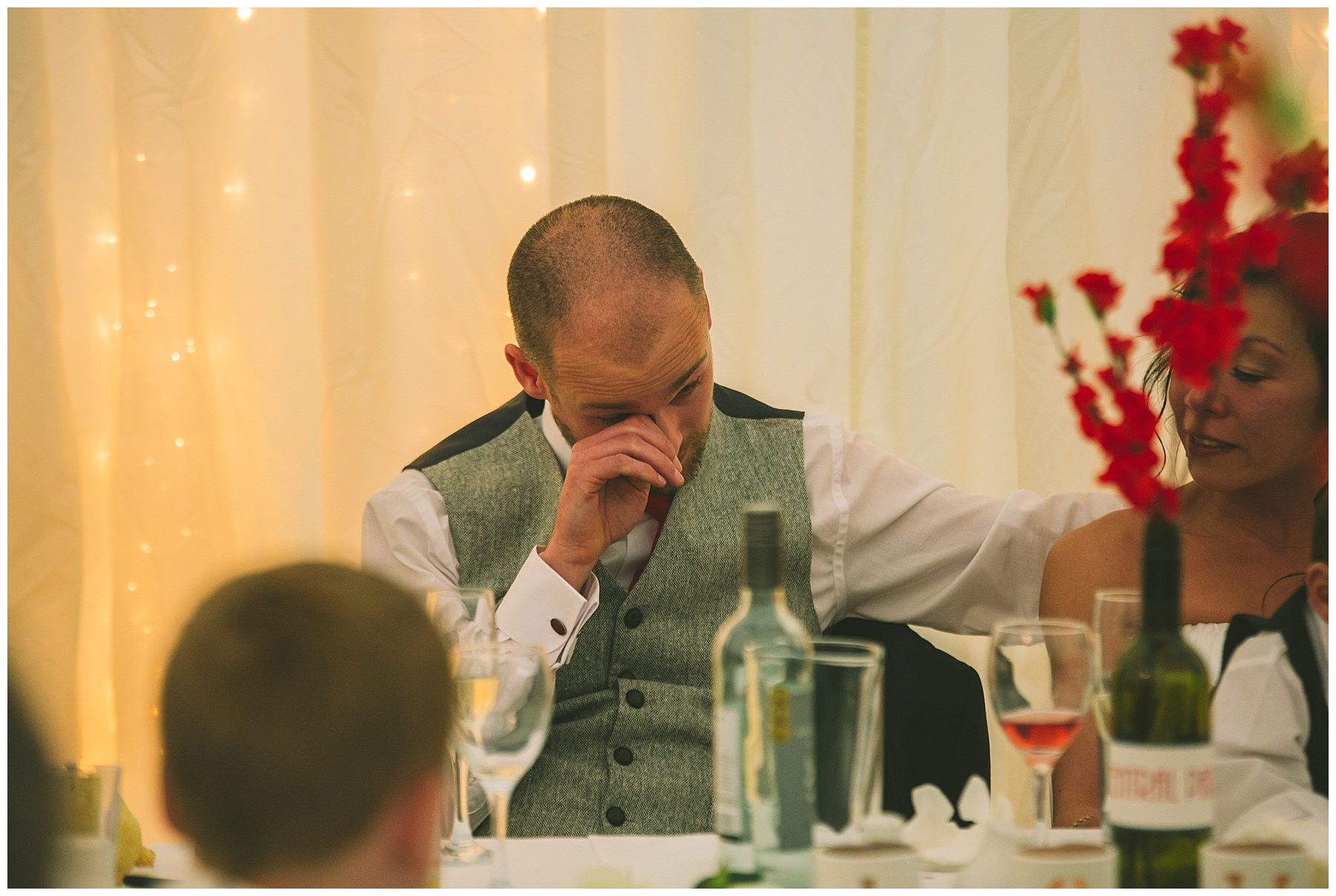groom sheds a tear during the best mens speech