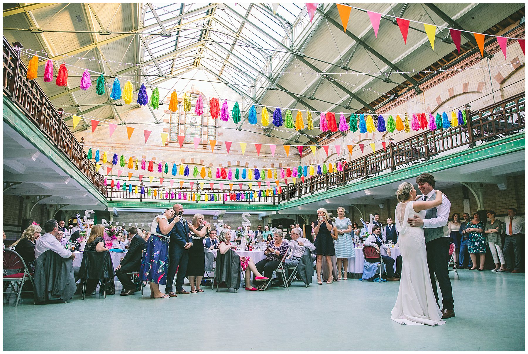 The happy couple share their first dance with friends and family at Victoria Baths