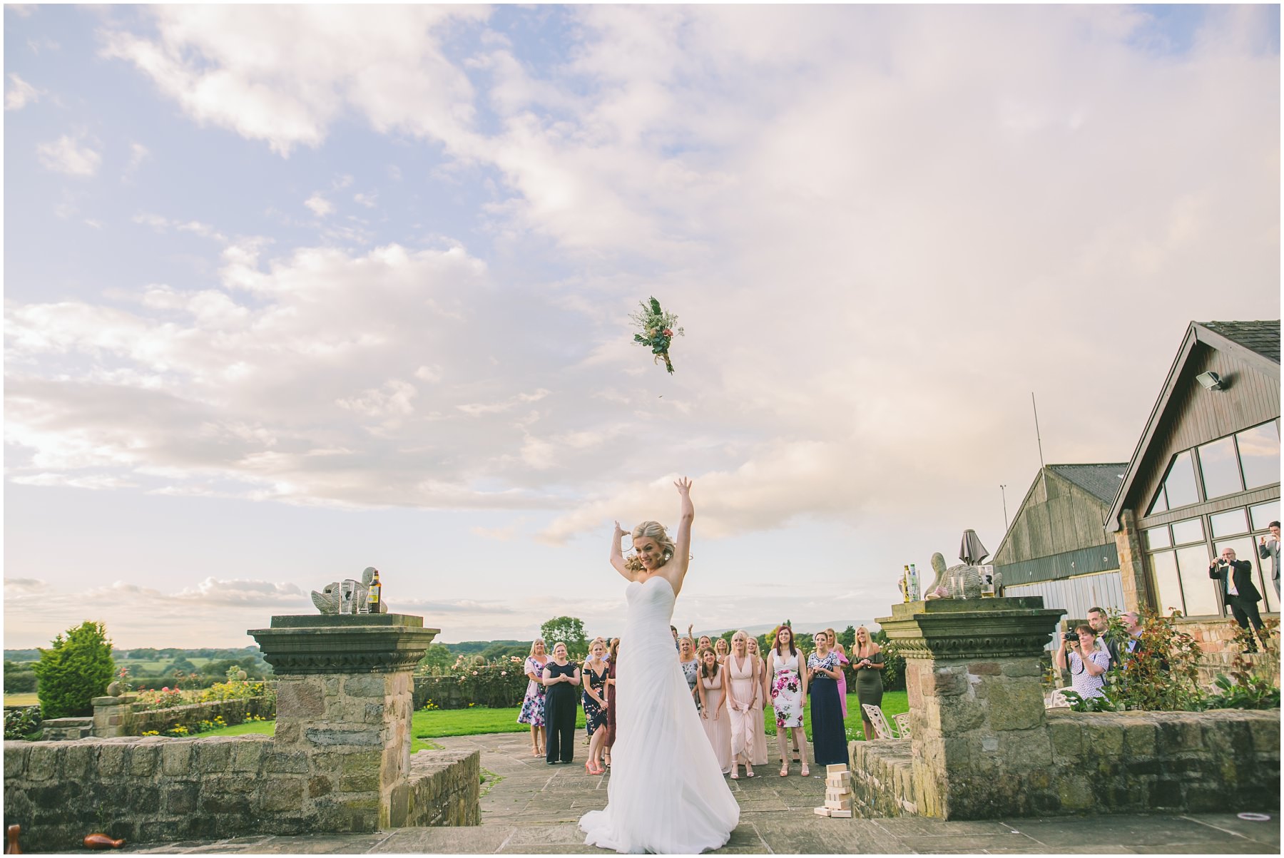 Bride throws her bouquet at Beeston Manor