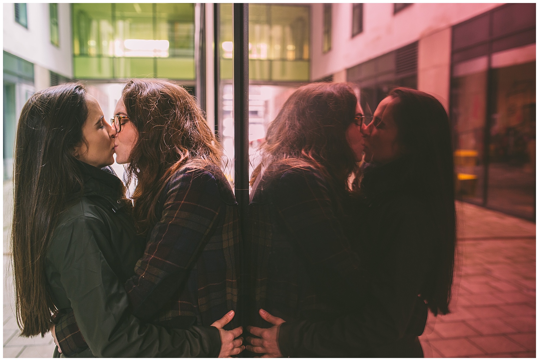 Same Sex couple share a kiss in Manchester