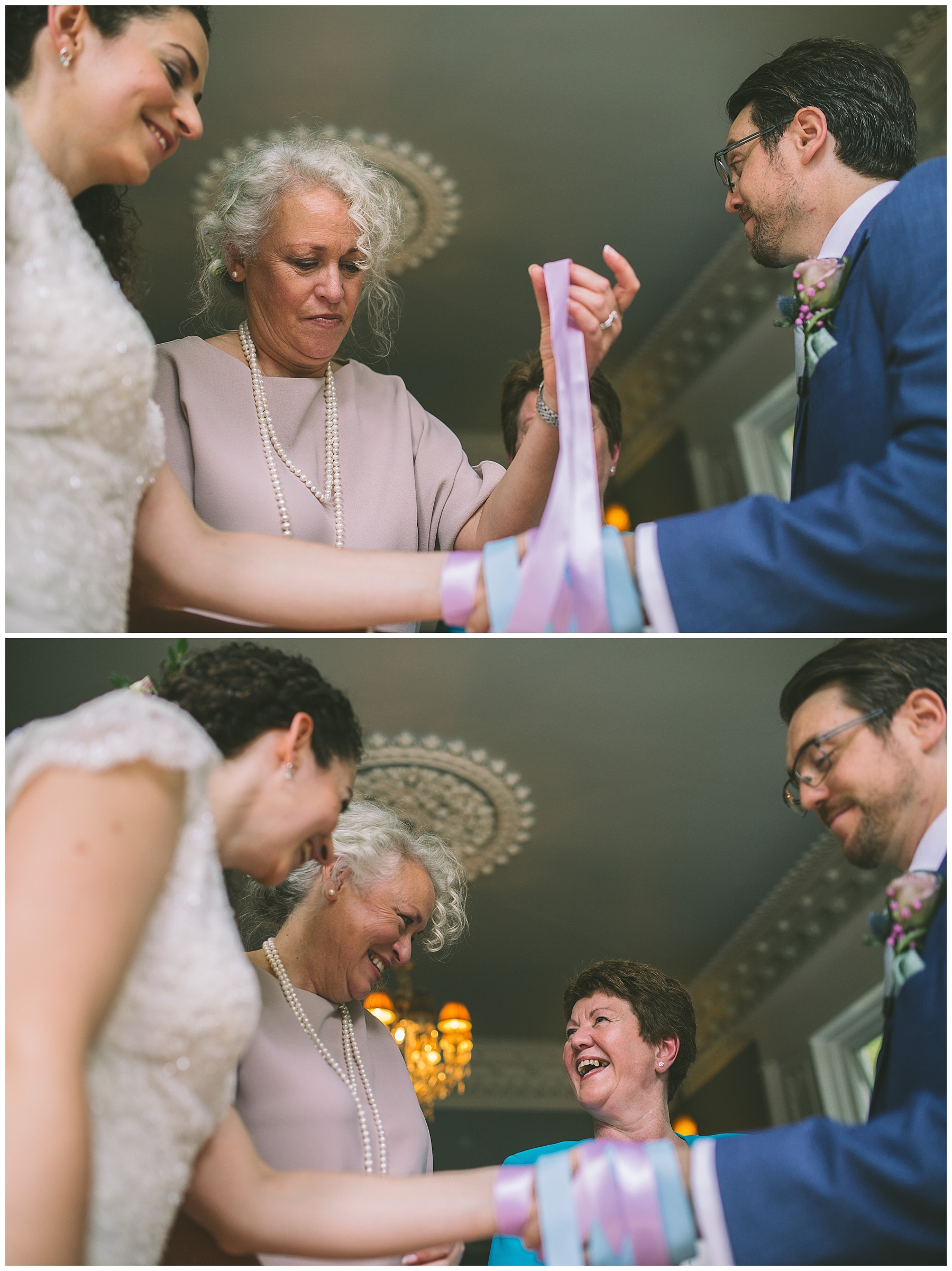Mothers of the bride and groom bind the couples hands in a traditional handfasting