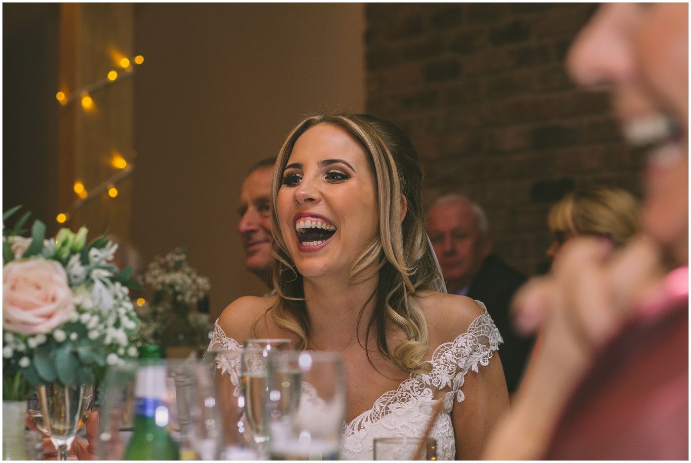 bride laughing during the speeches at her pryors hayes wedding