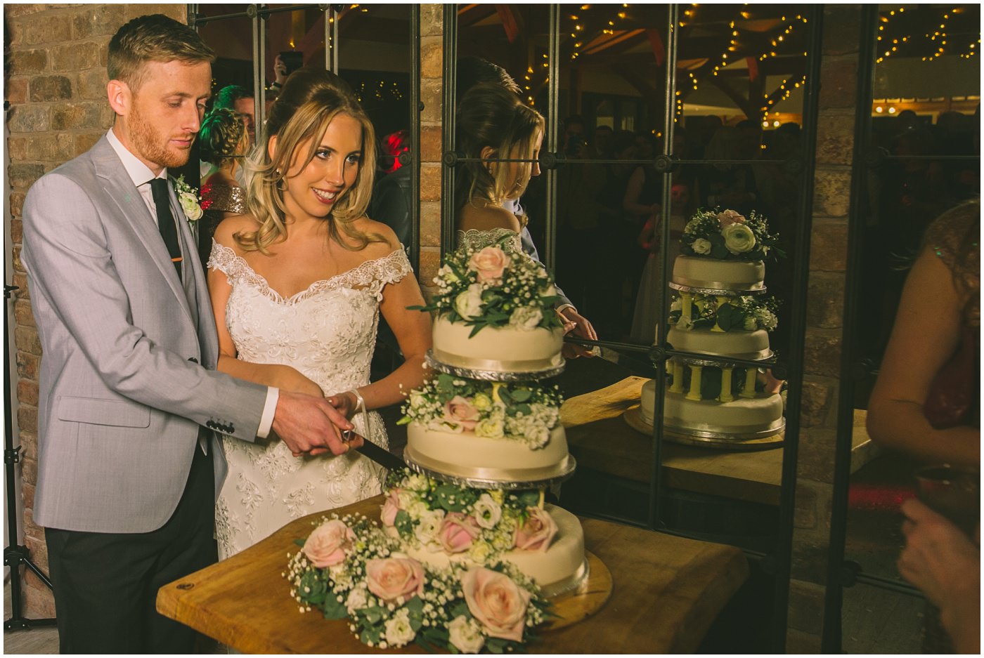 bride and groom cut the cake at Pryors Hayes