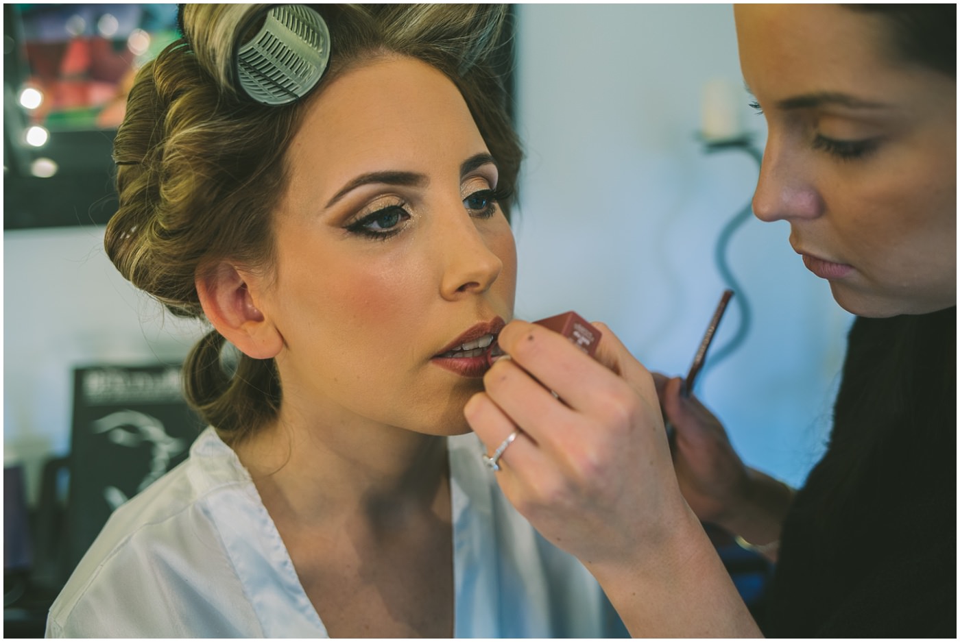 Lipstick being applied for bride