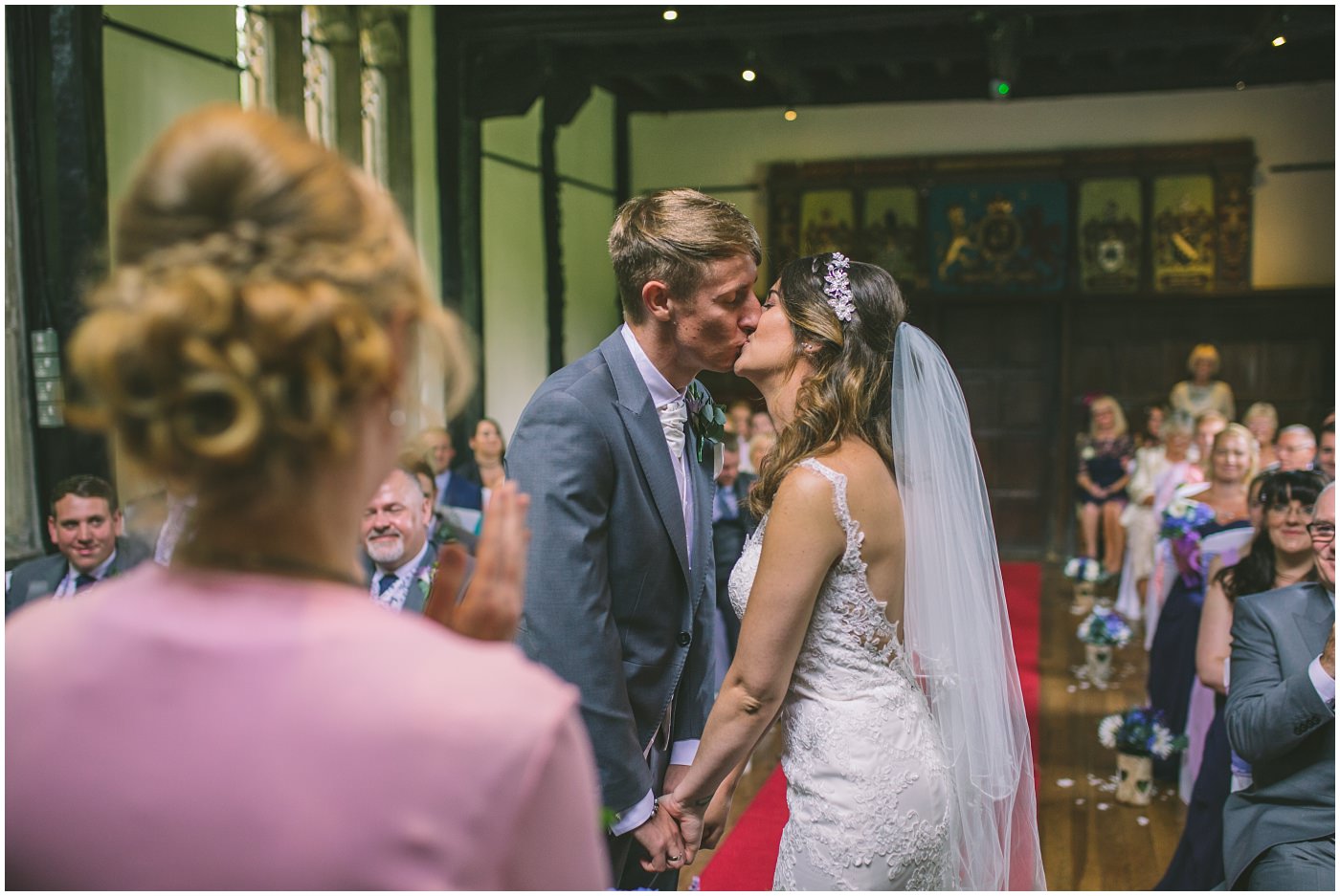 bride and grooms first kiss as they are pronounced husband and wife