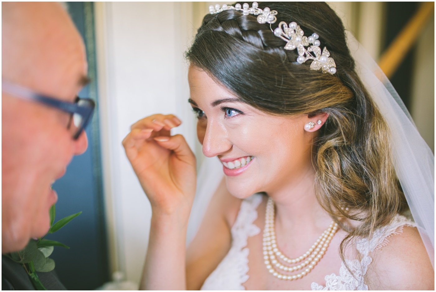 Tears from the bride as her dad sees her in her dress for the first time