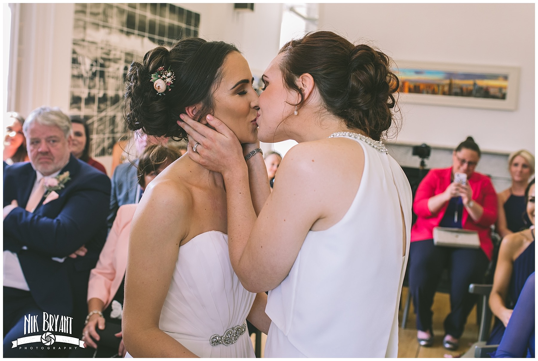 the first kiss of newly wed same sex couple