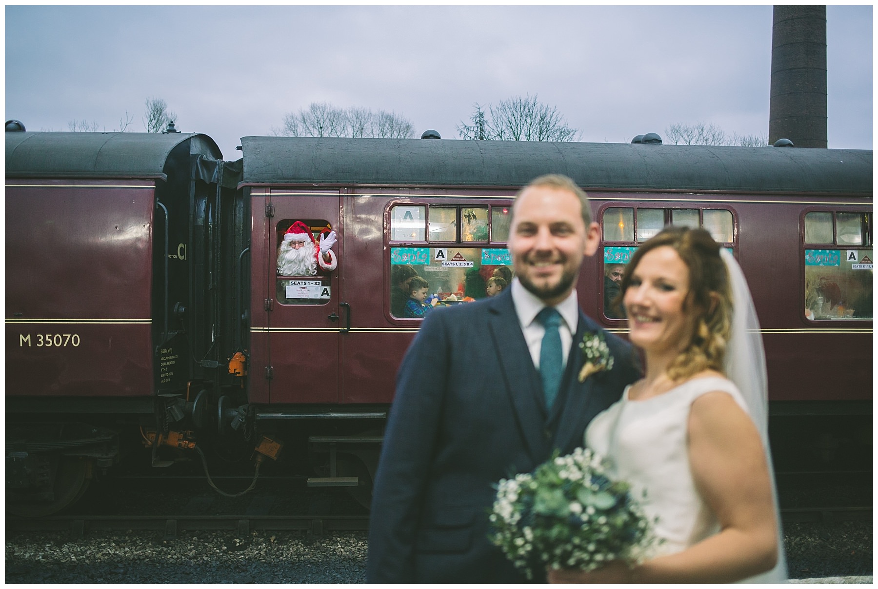 father Christmas photobombs newly married couple