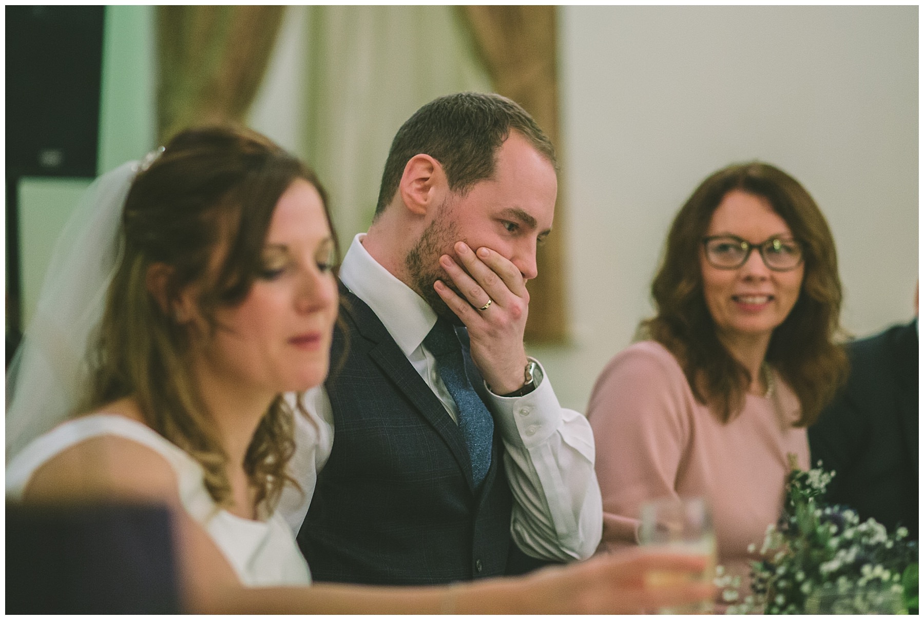Groom reacts to speeches at ramsbottom wedding