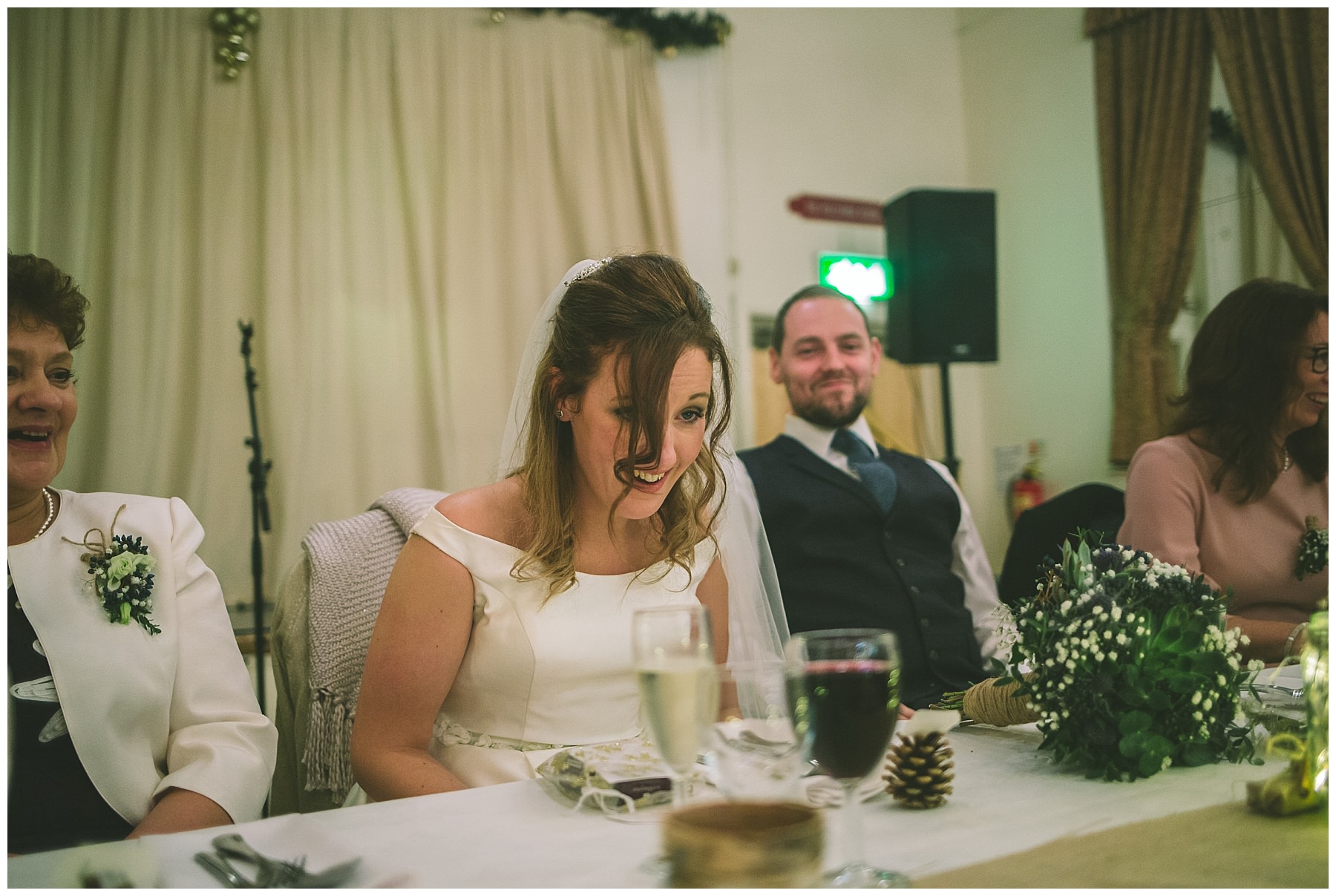 Bride reacts to speeches at ramsbottom wedding