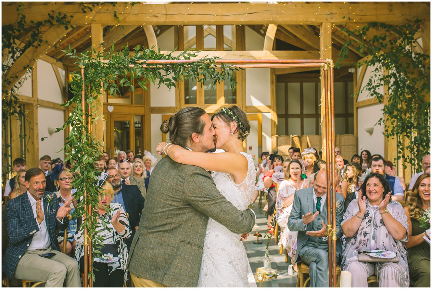 Bride and Groom kiss in wedding ceremony in knutsford