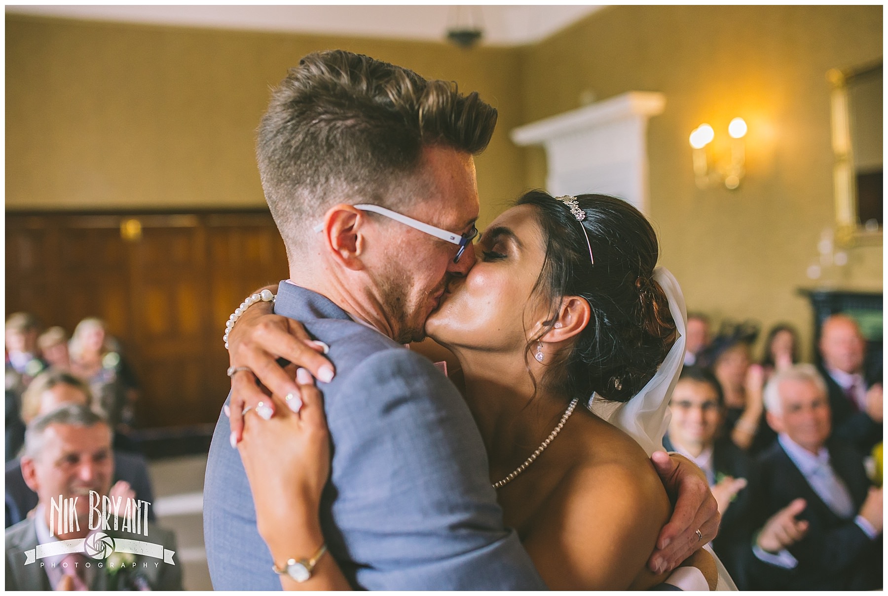 Bride and grooms first kiss at shrigley hall