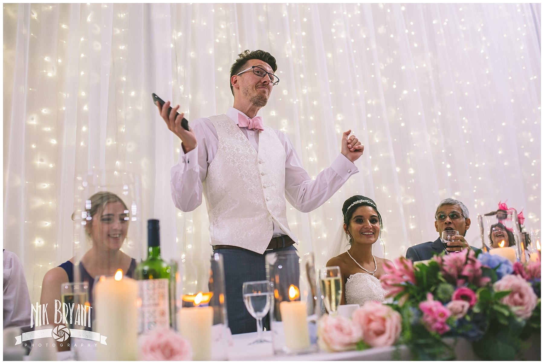Groom stands to give his speech