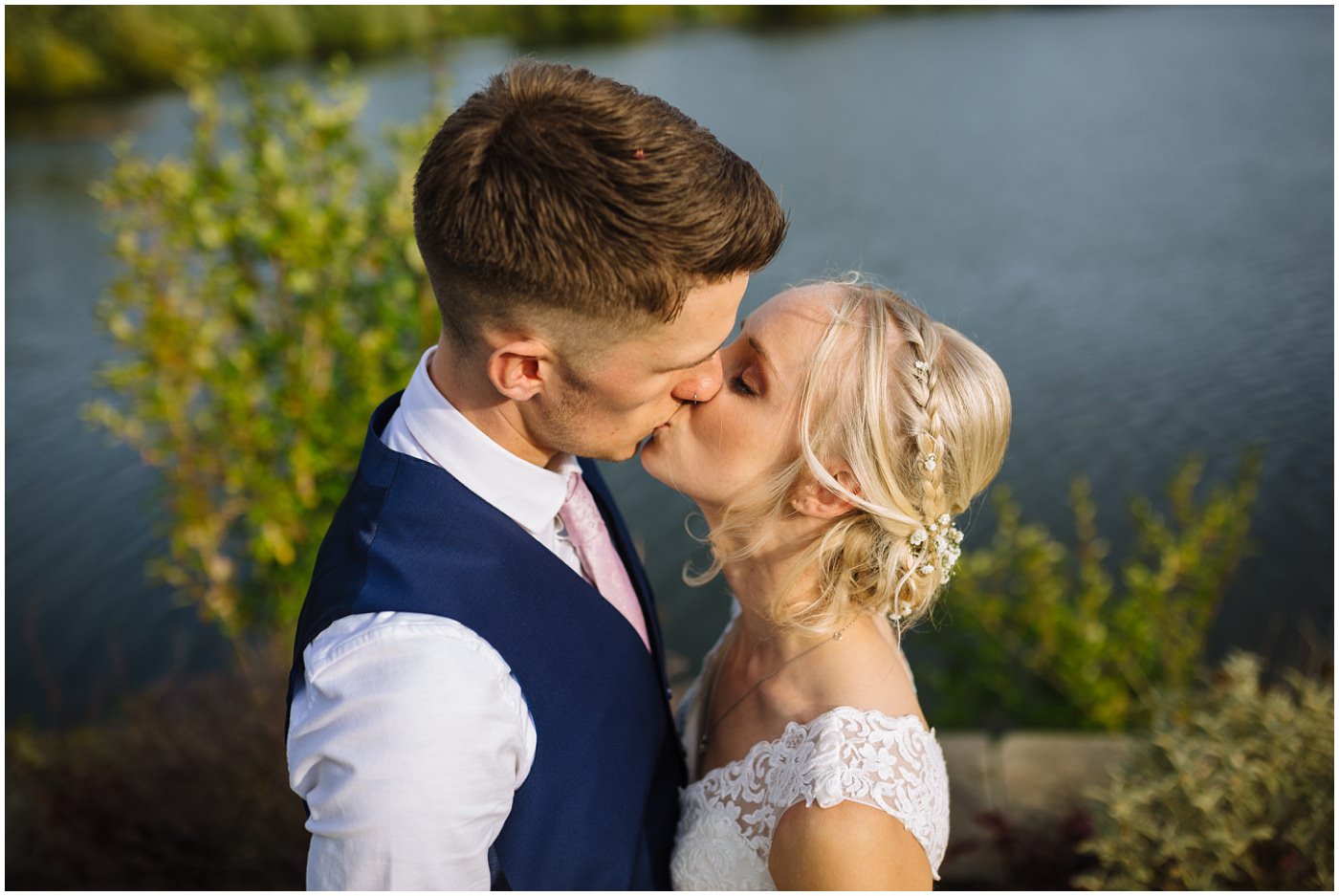 bride and groom kiss at waterton park