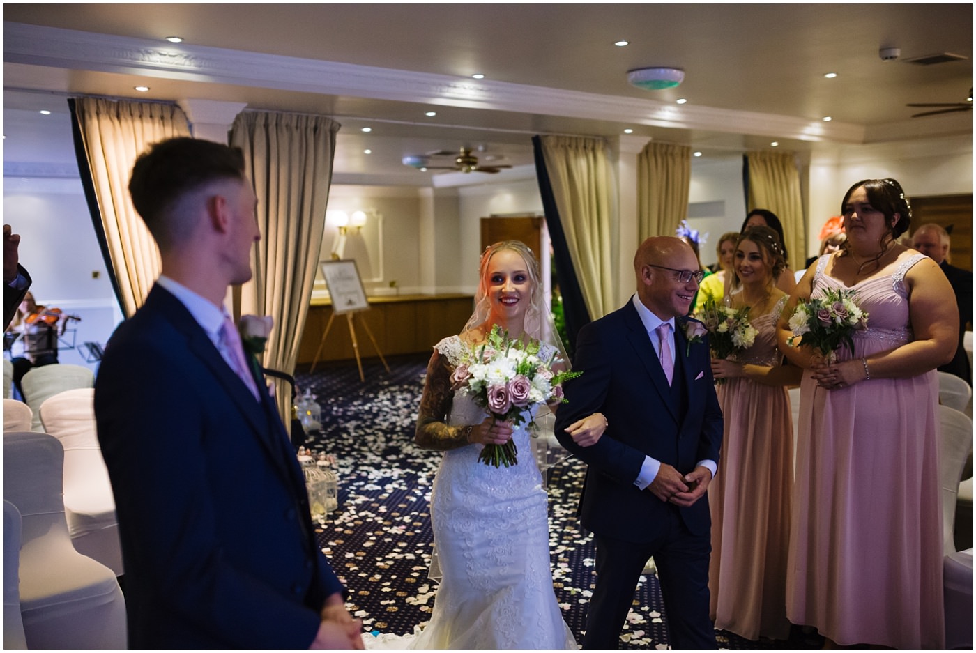 bride arrives at ceremony room