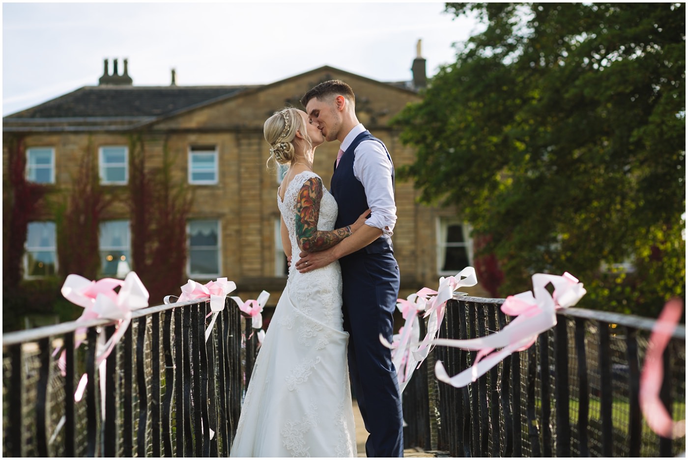 tattooed couple on the bridge at waterton park hotel