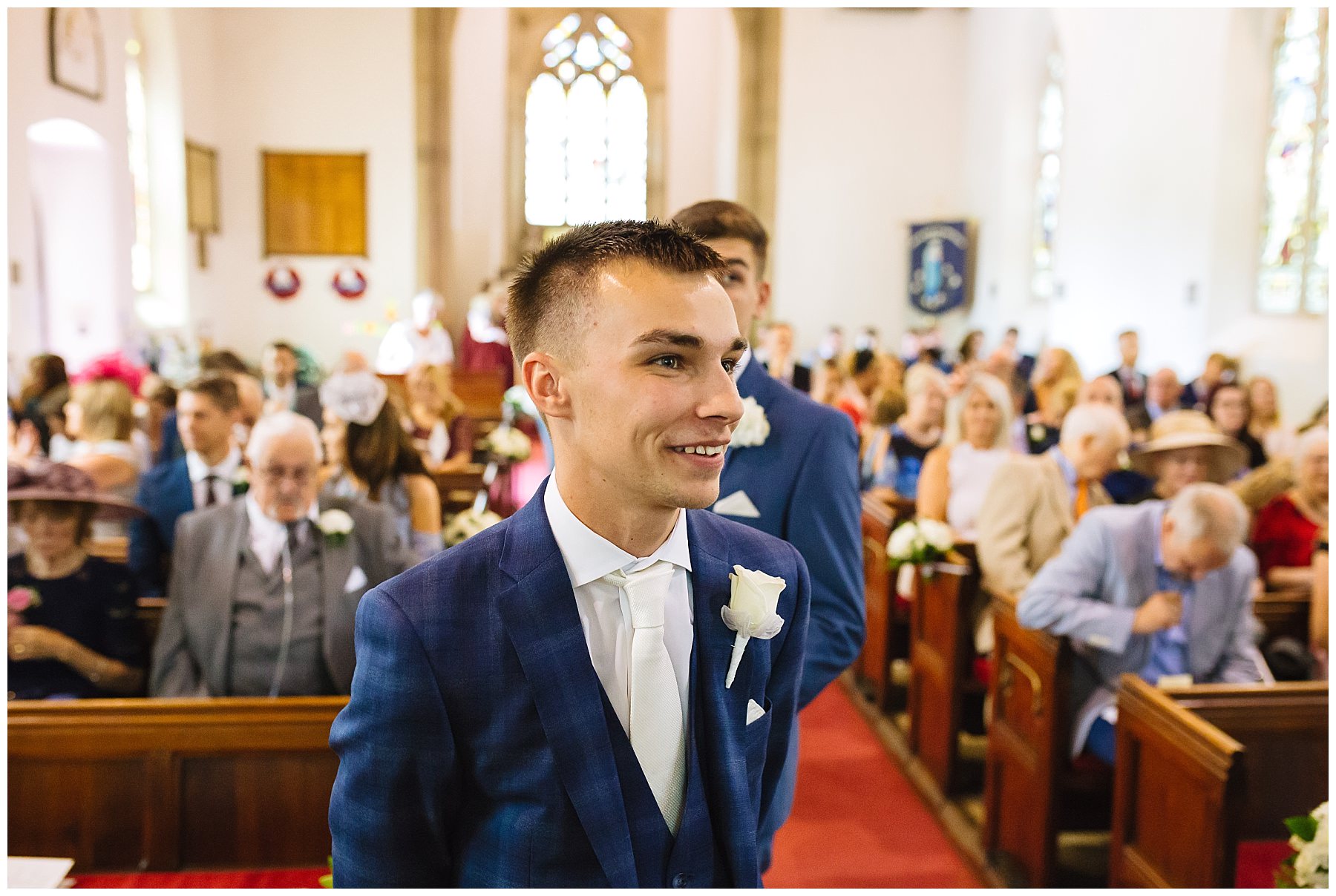 groom waiting nervously at church