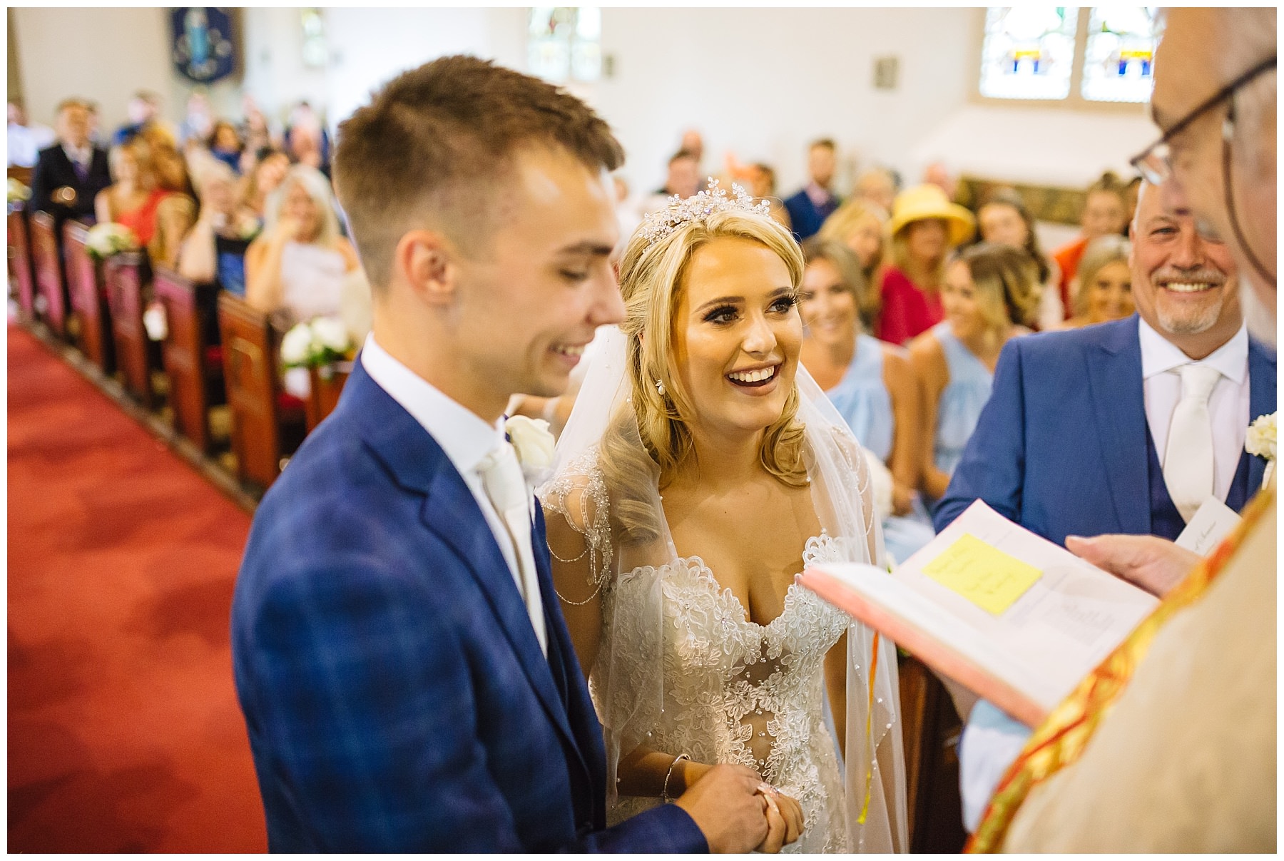 bride and groom smile during Ribble valley church wedding