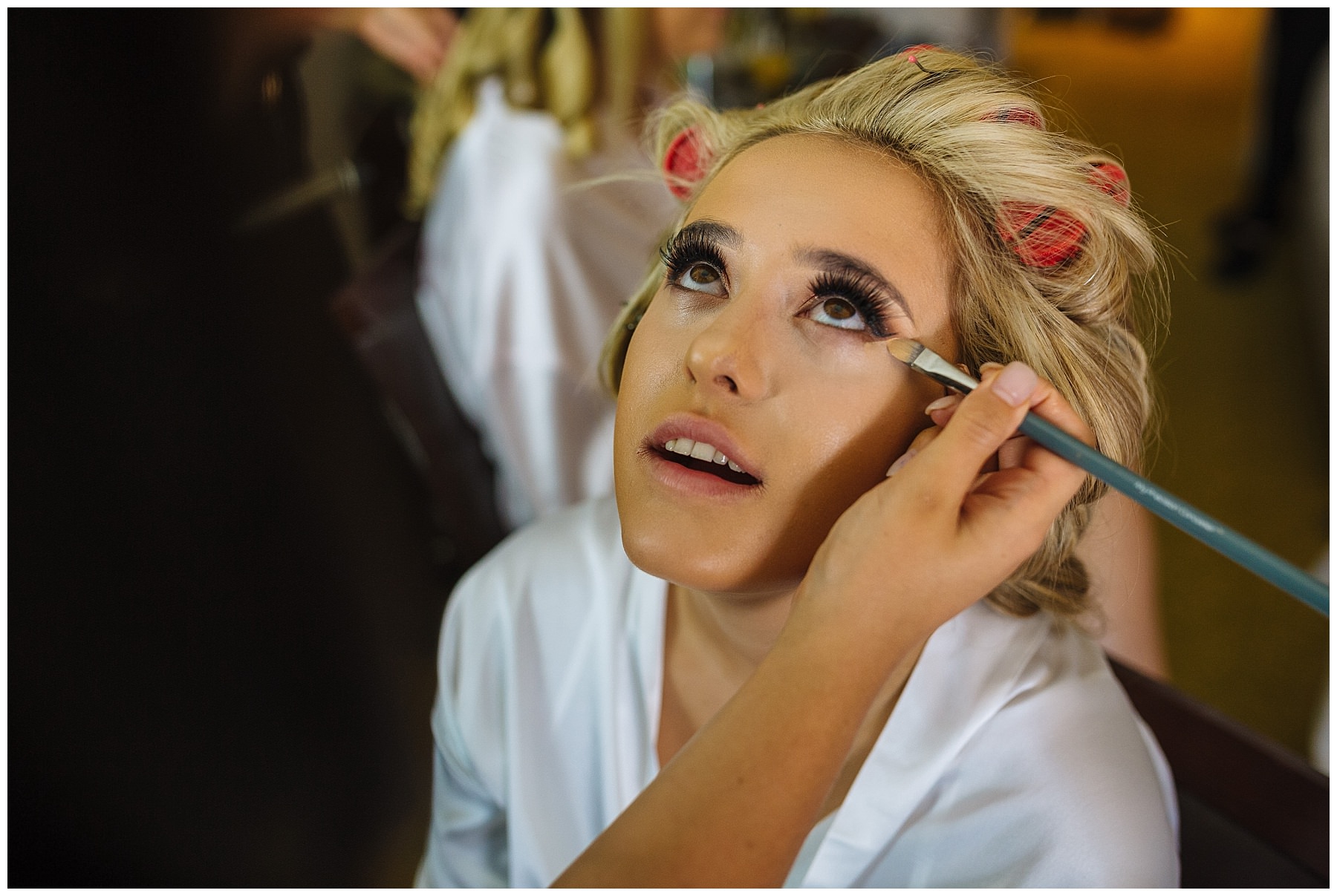 the makeup company working their magic on bartle hall bride