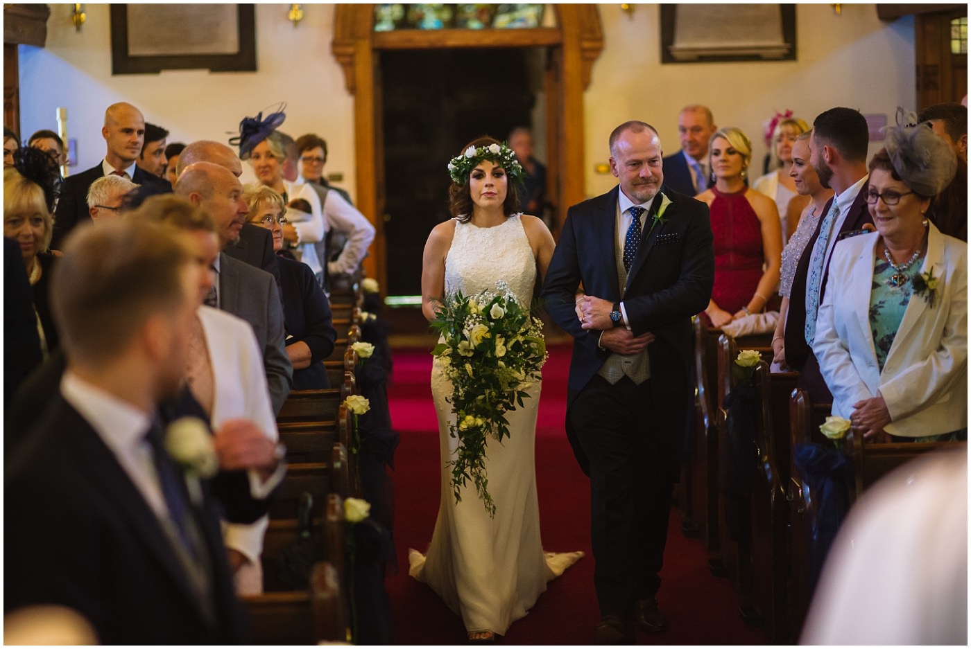 bride walked down the isle by father