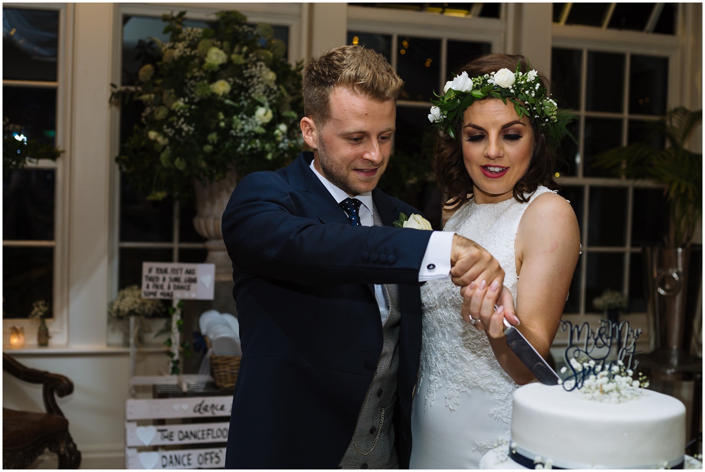 Bride and Groom cut the cake