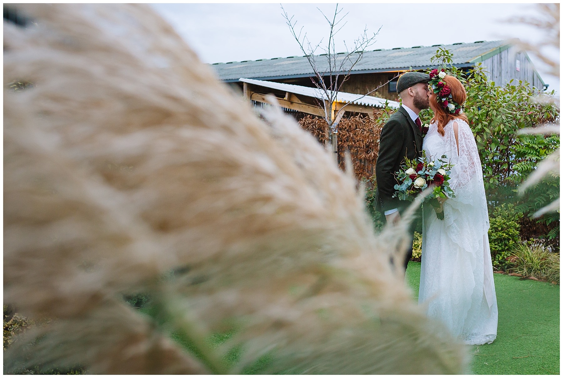 Kissing couple in the pampas grass