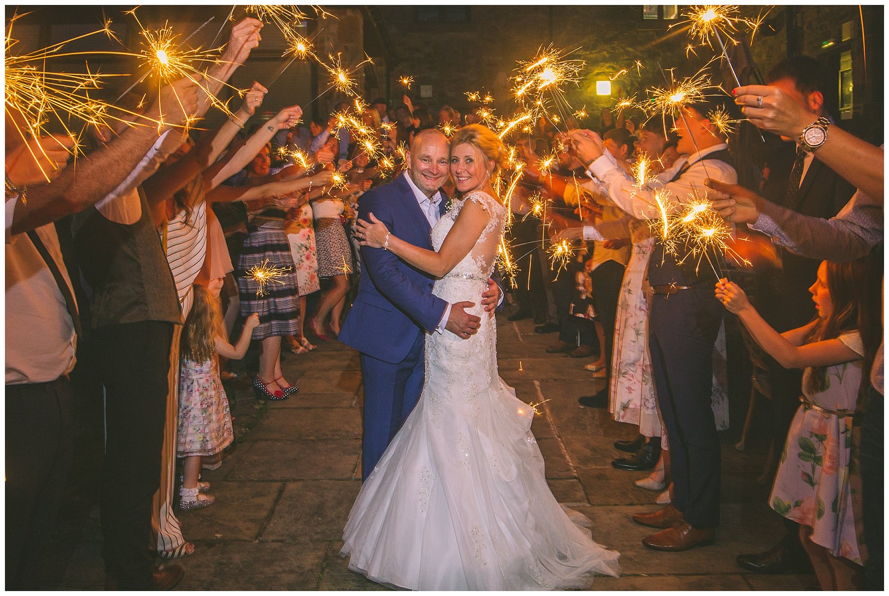 bride and groom perform sparkler exit at beeston manor