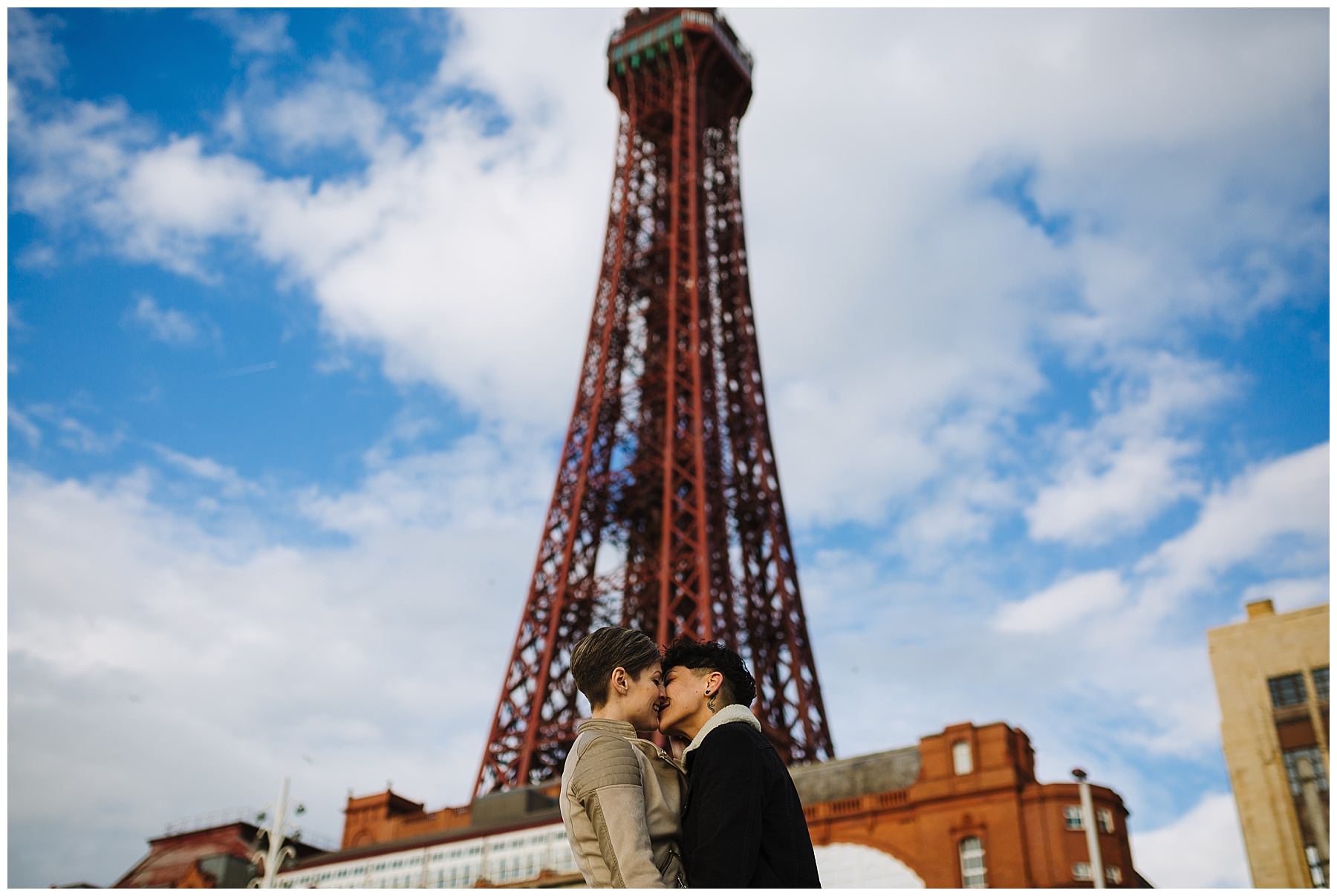 Same sex couple in front of Blackpool tower