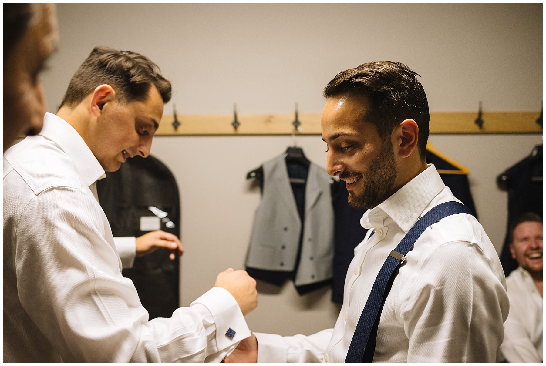 Groom and groomsmen in changing rooms at pryors hayes