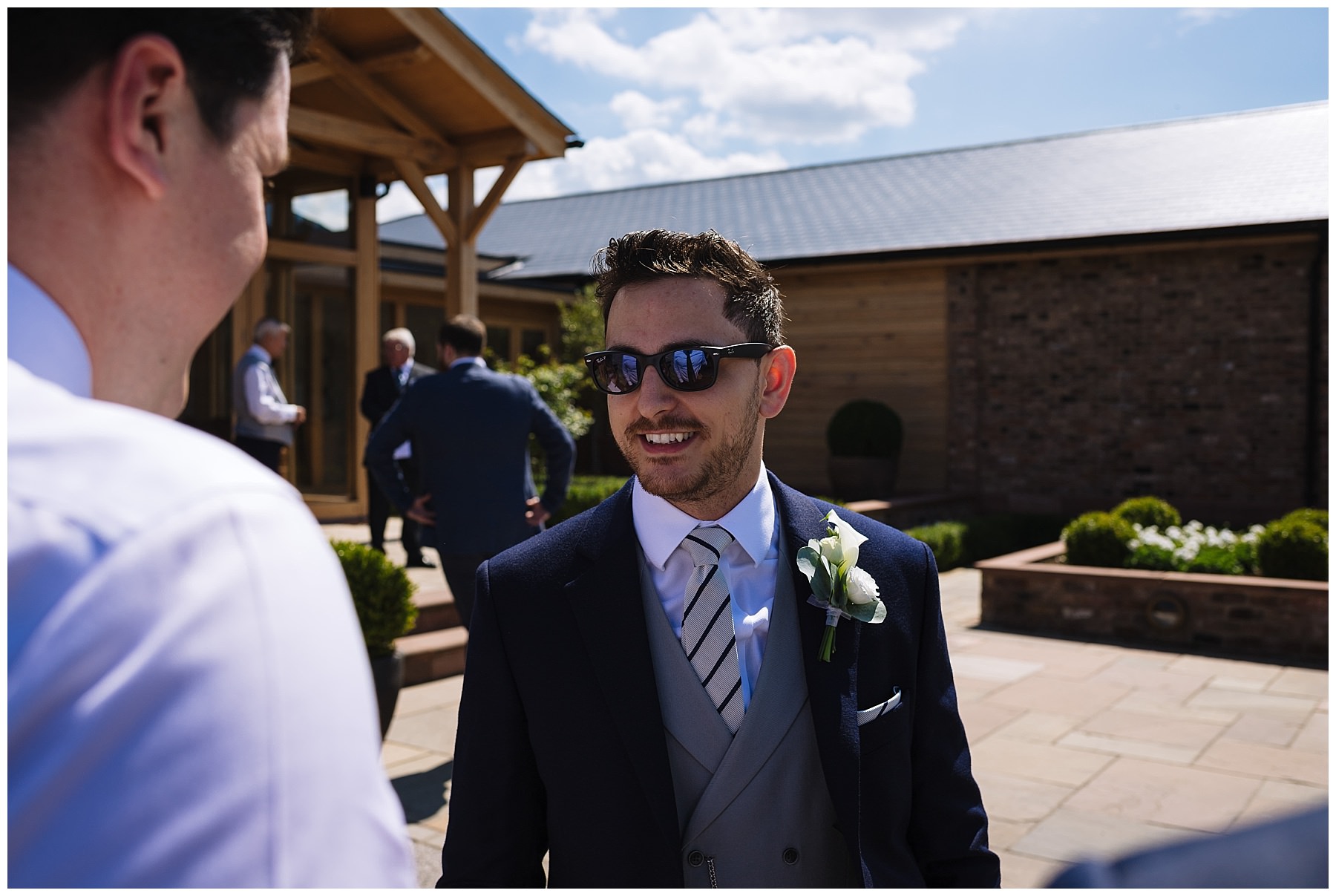 groom greats guests at pryors hayes