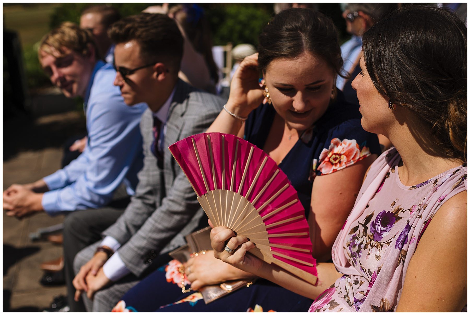 wedding guests at outdoor wedding ceremony