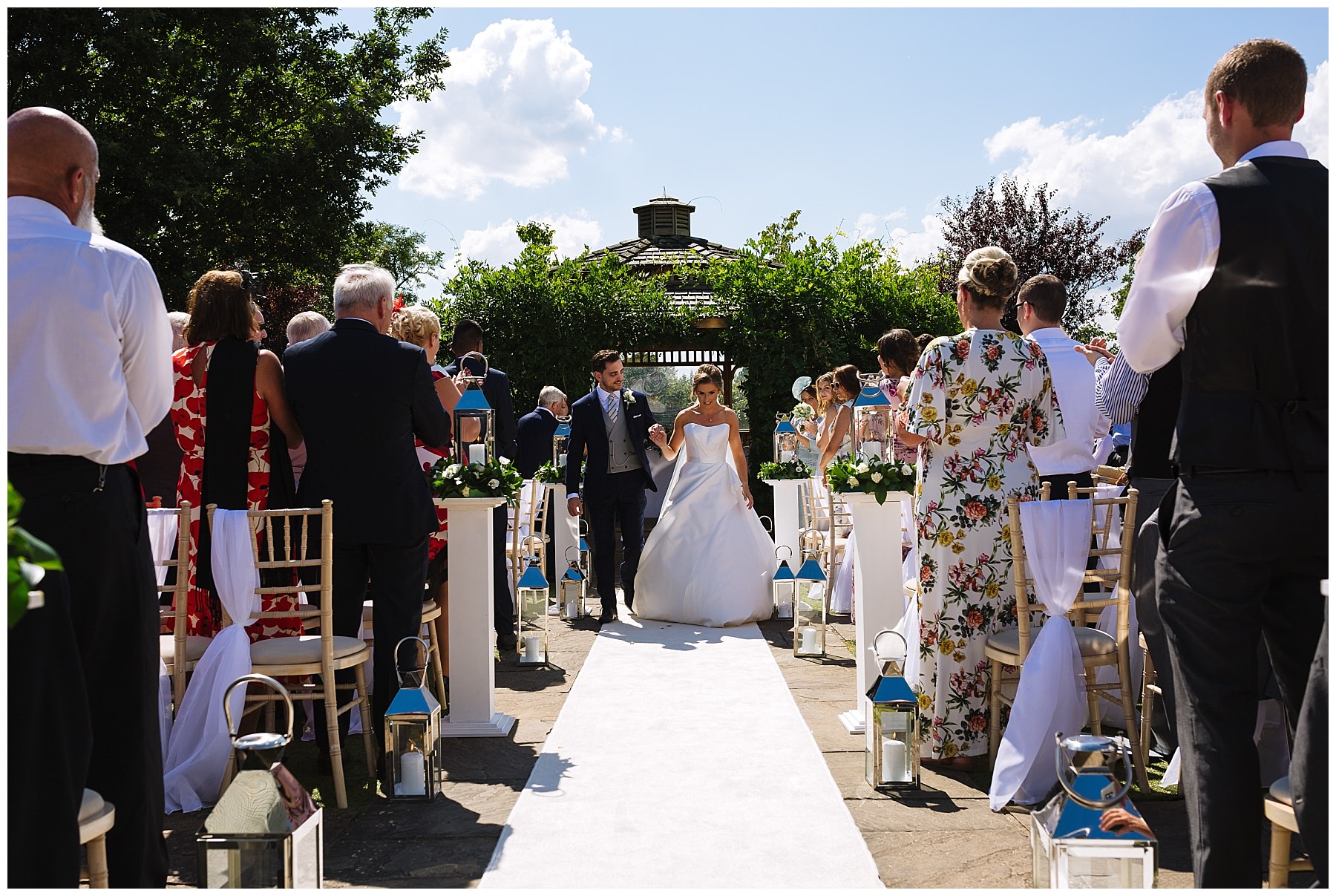 bride and groom exit outdoor wedding ceremony