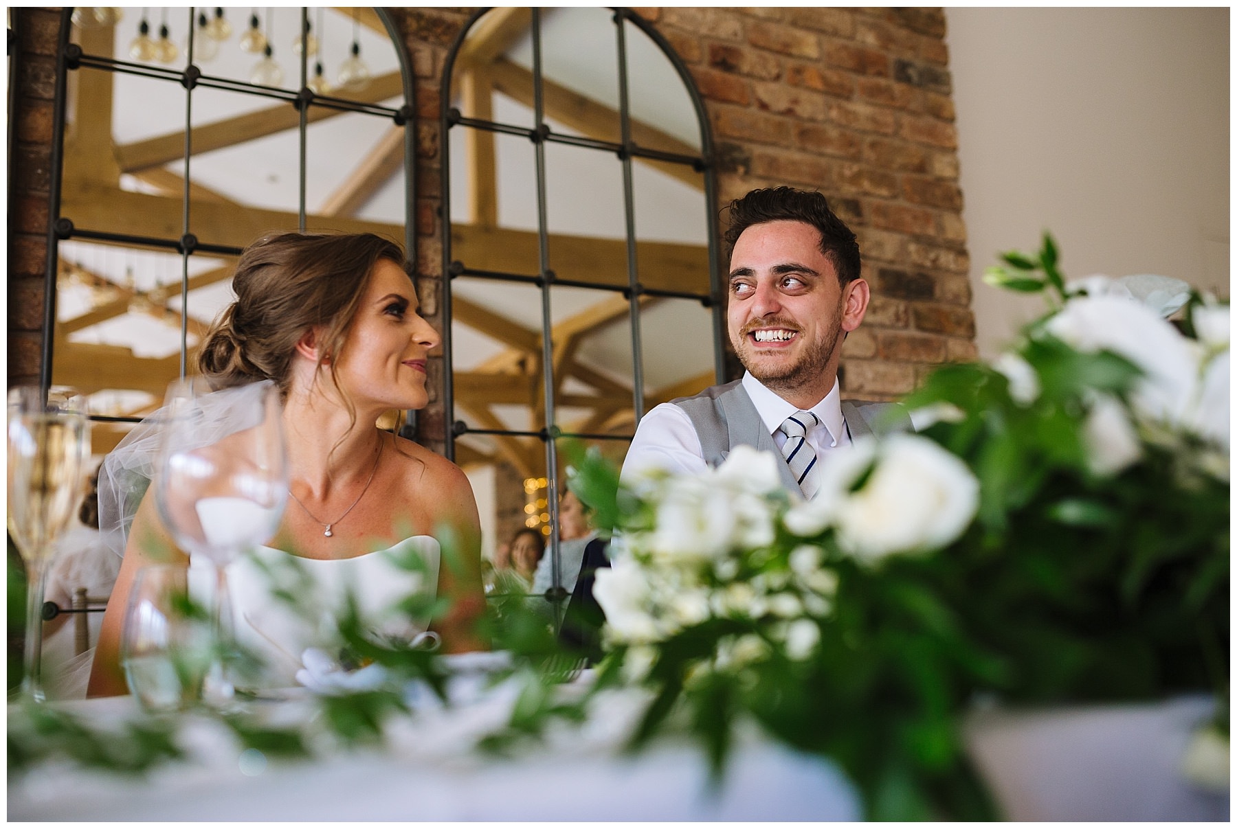 bride and groom react to best mans speech