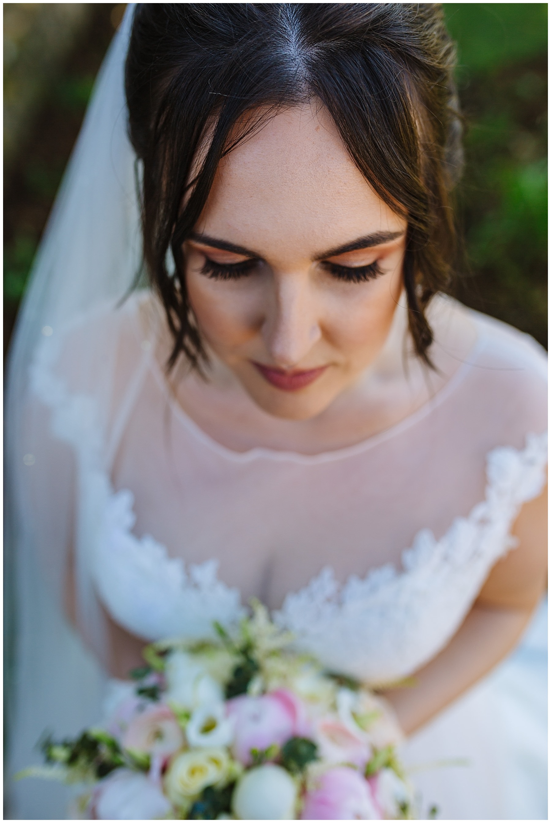 Bridal portrait showing hair and make up and flowers