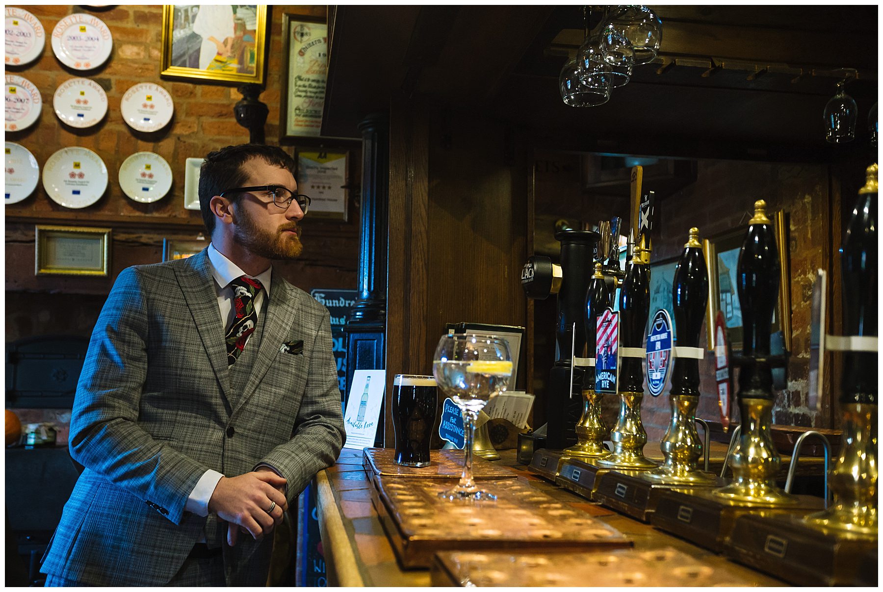 Groom at the bar at The Hundred House Hotel