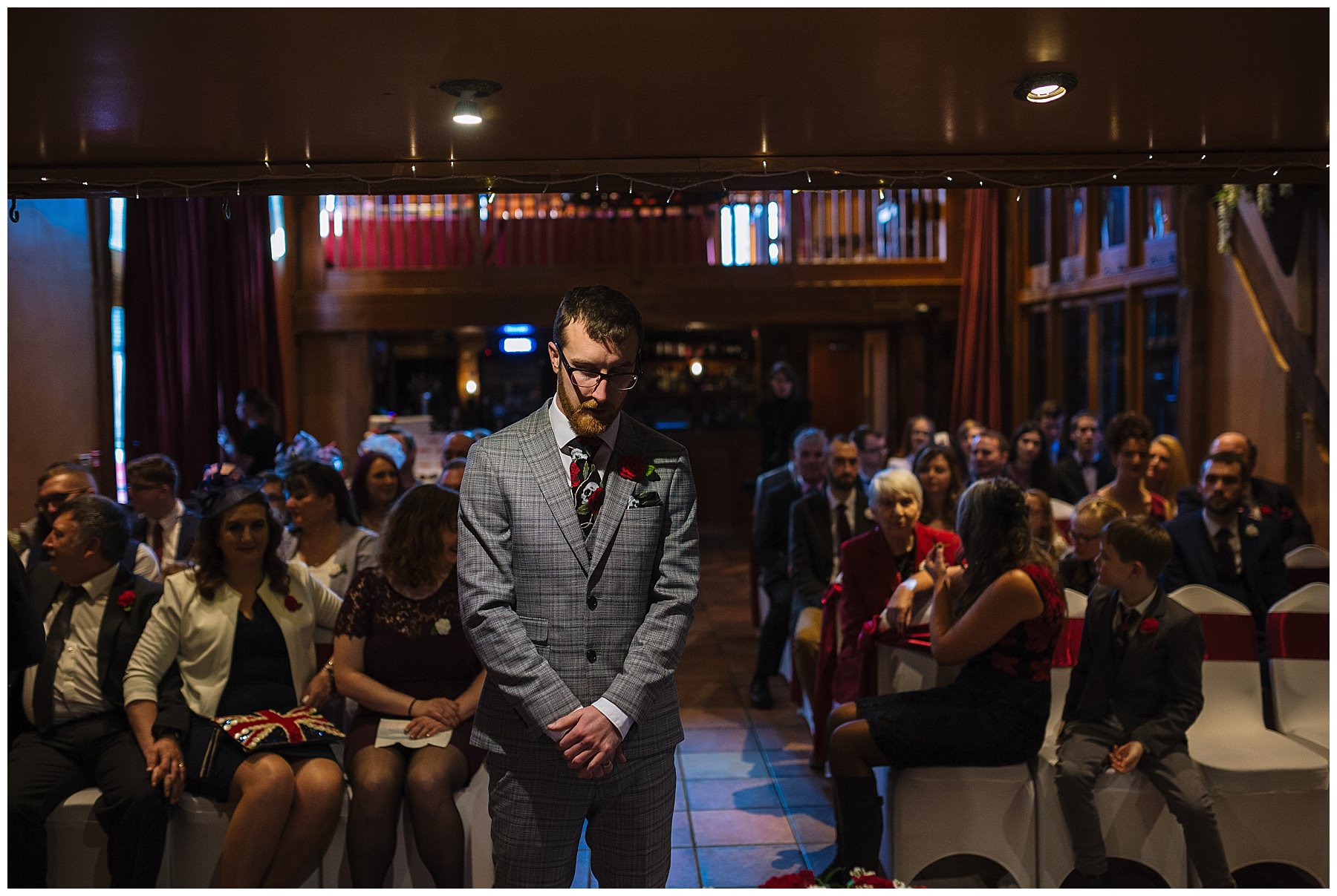 Groom waits nervously for his bride at the hundred house hotel