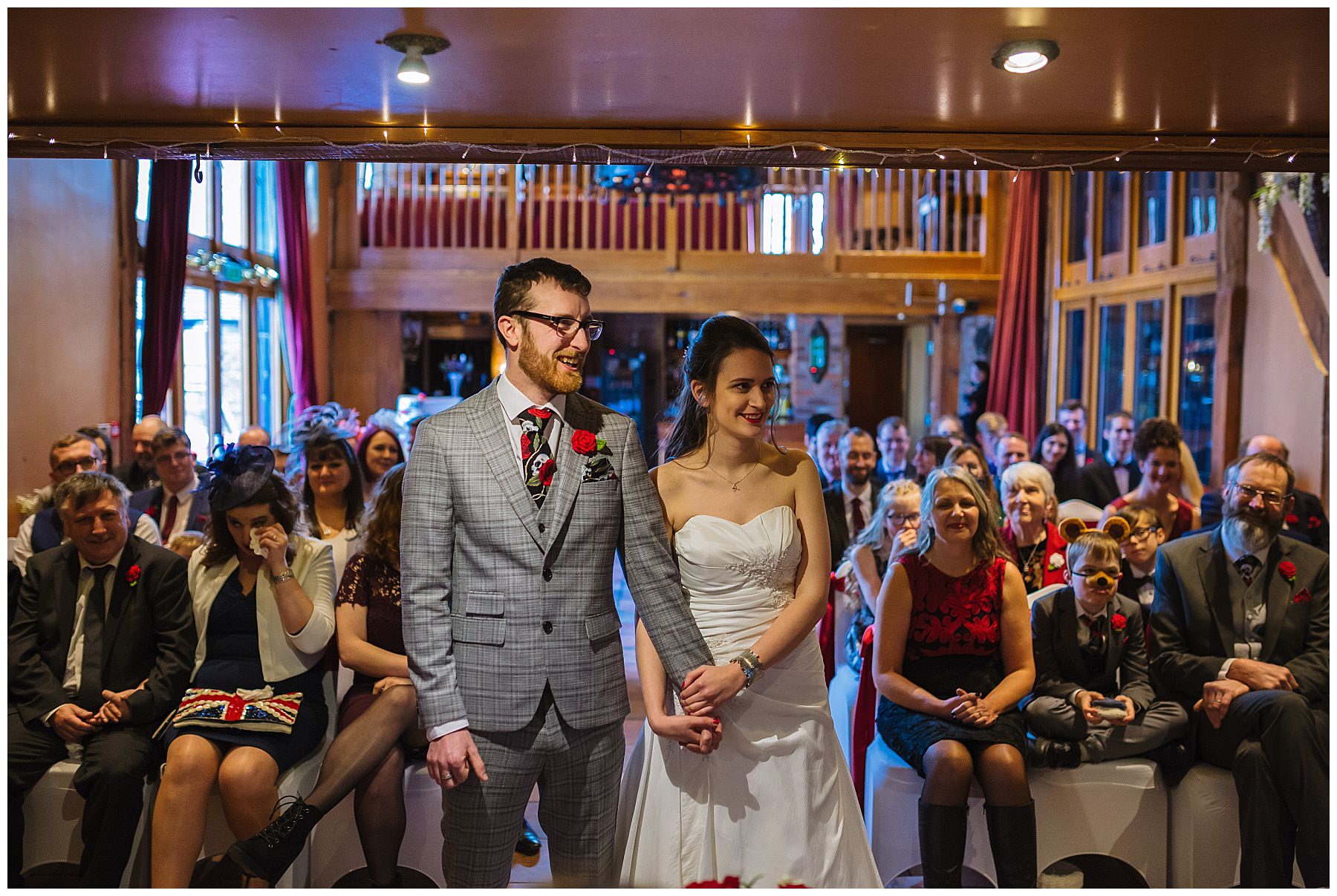 Bride and groom during wedding ceremony at the hundred house hotel