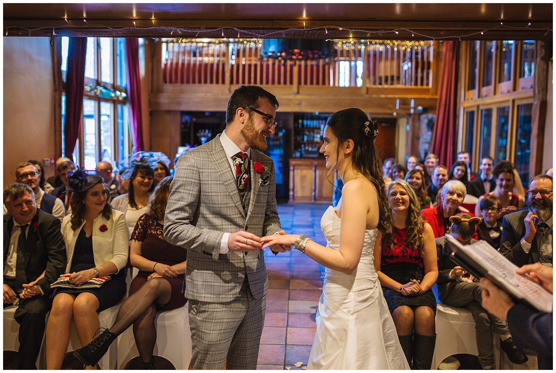 Bride and Groom exchange wedding rings