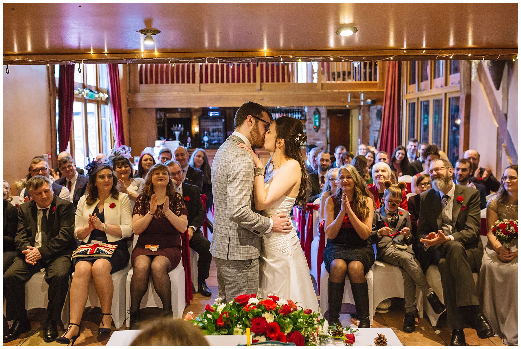 First kiss for bride and groom at hundred house hotel