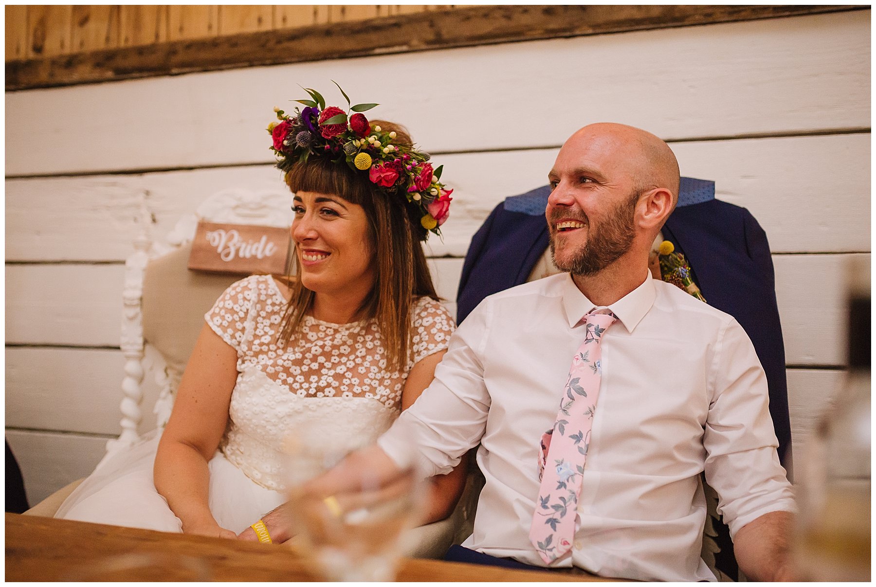 bride and groom laugh during bolton farm wedding