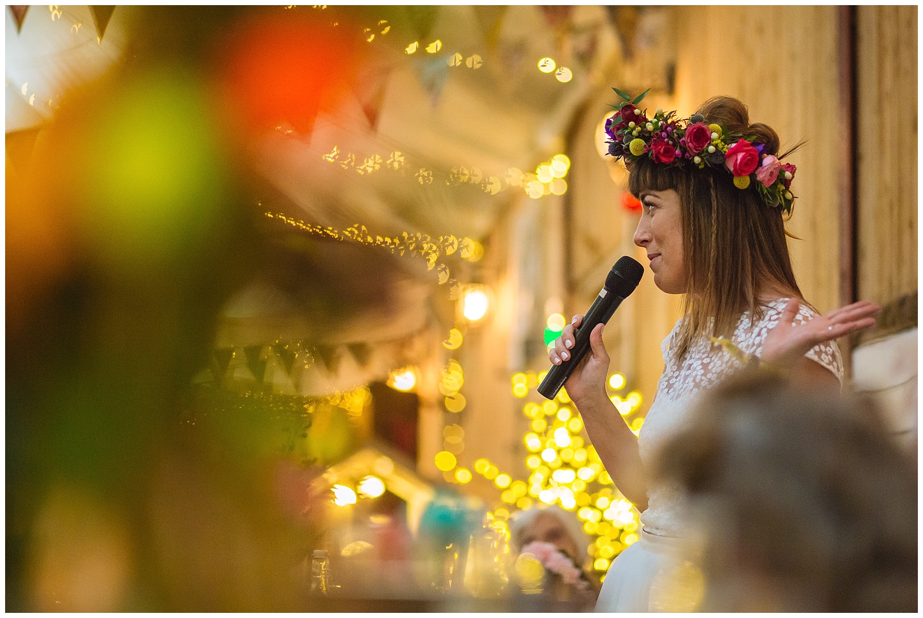 brides speech during quirky festival wedding
