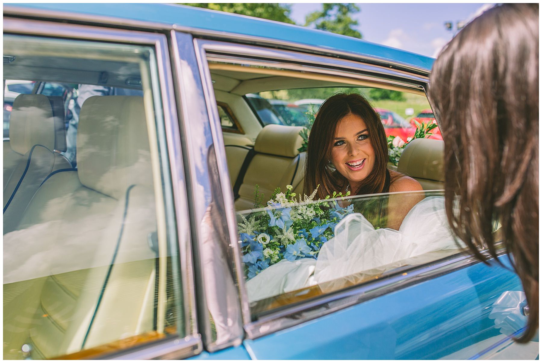 bride arrives at rivington barn ahead of wedding ceremony