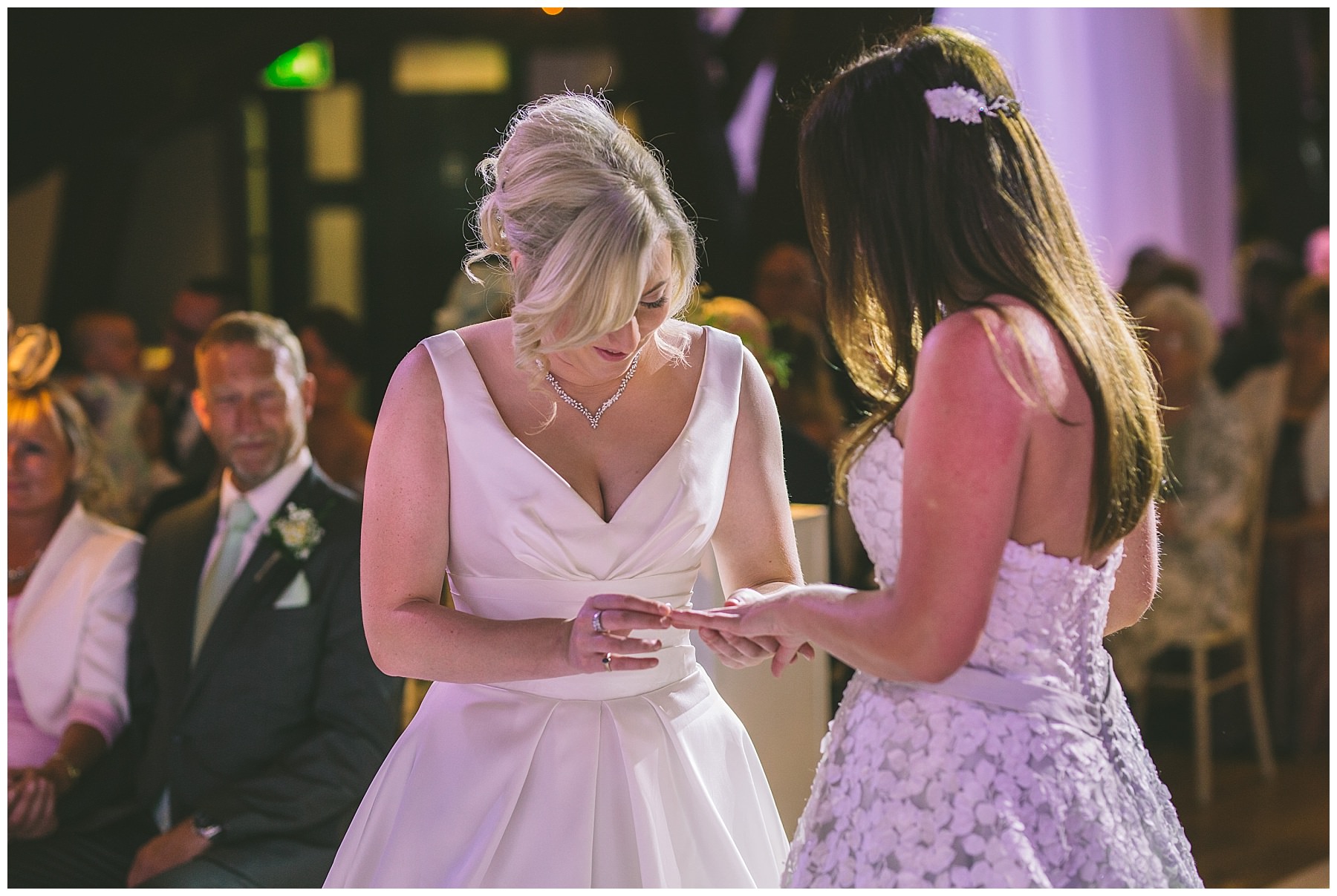 brides exchange wedding rings during Rivington Barn Wedding