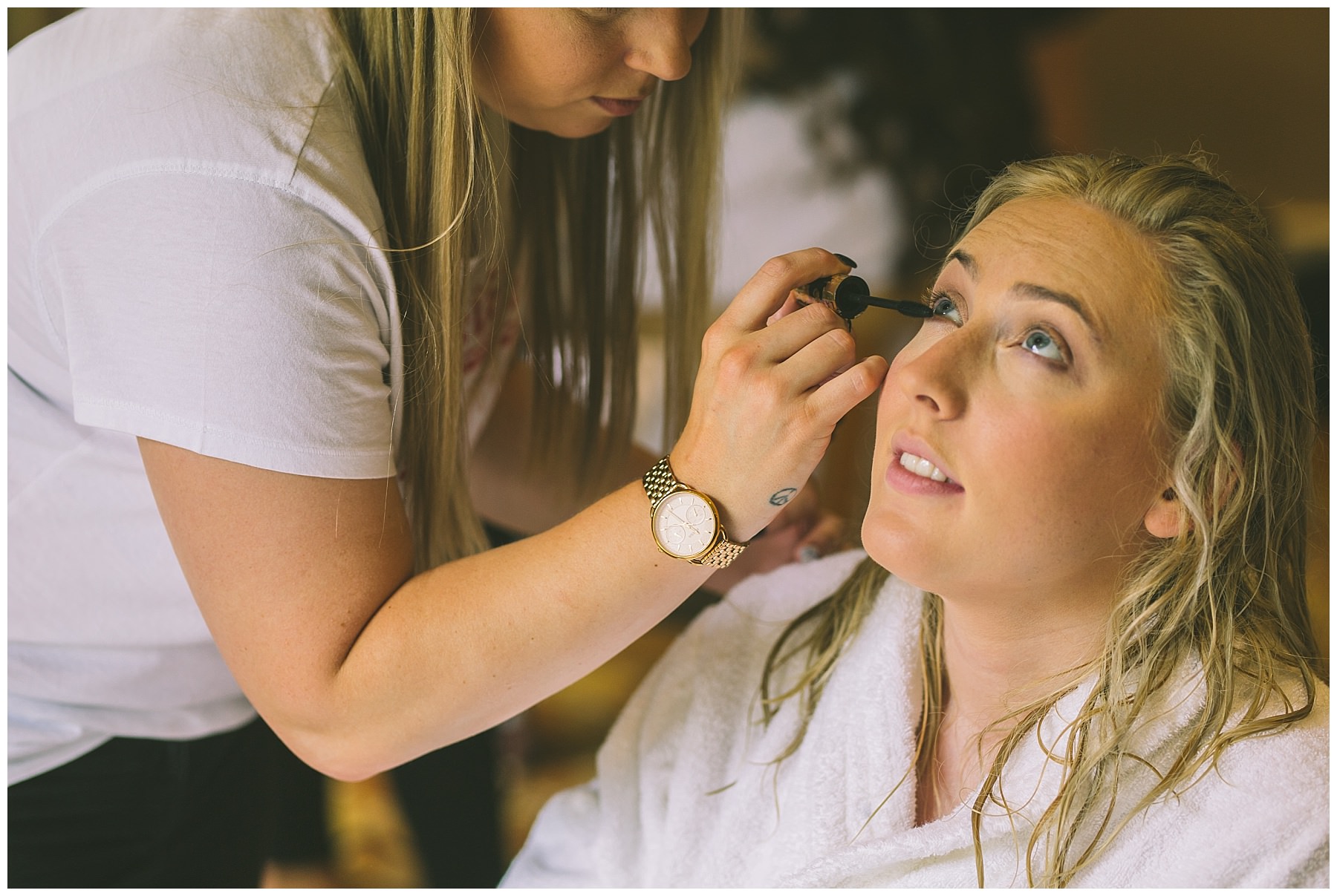 bridal make up being applied for rivington barn wedding