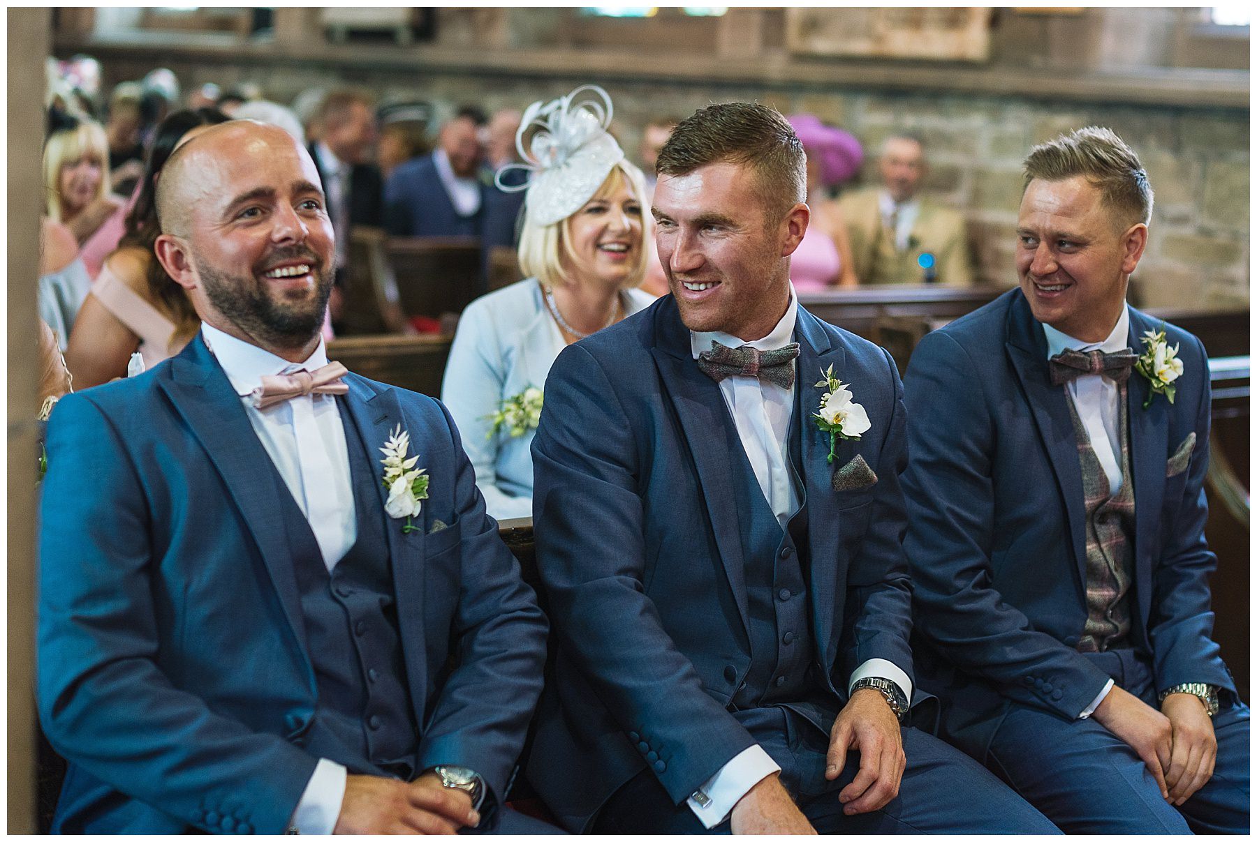 groom and groomsmen in church awaiting brides arrival