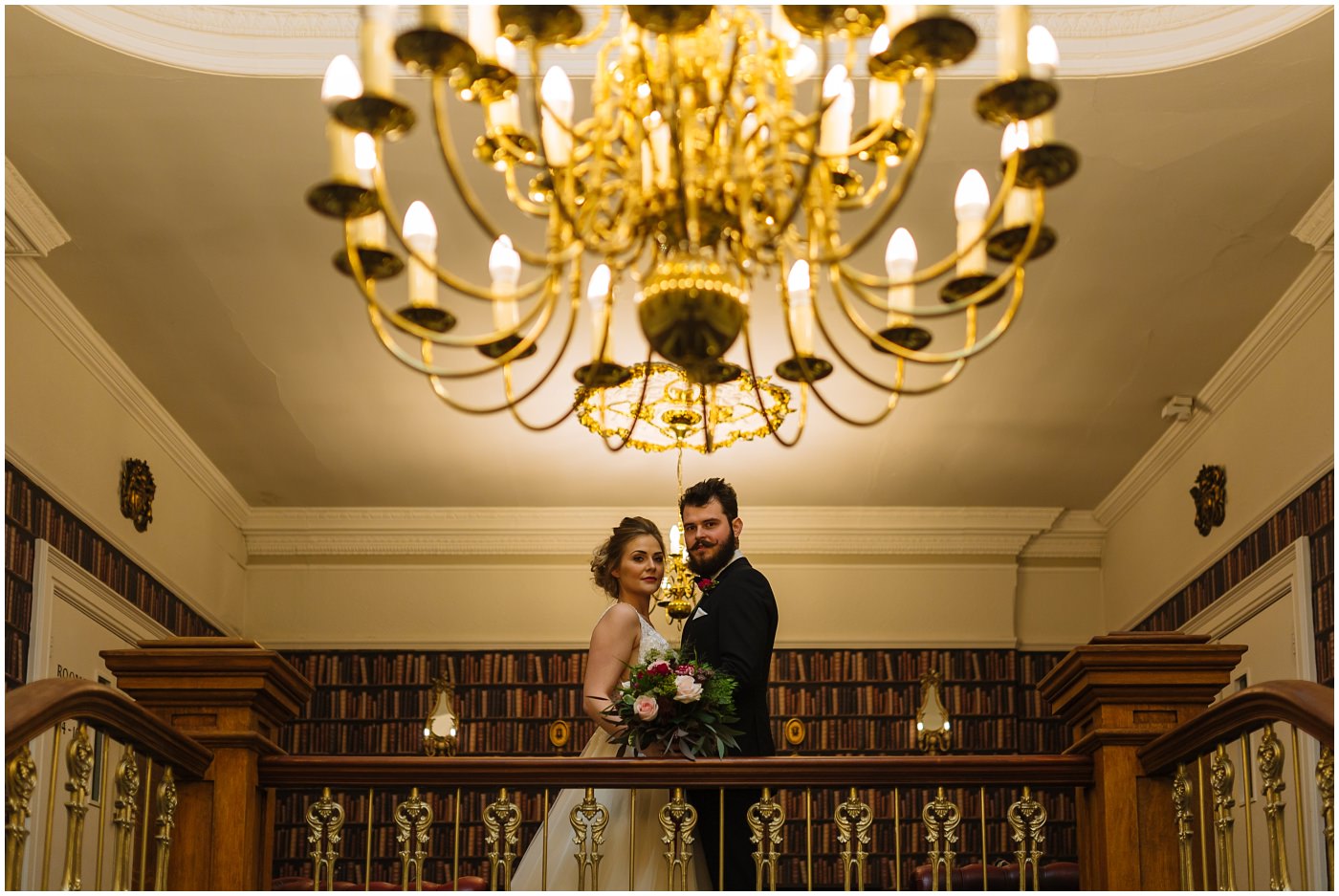 bridal portraits on the staircase at Ashfield House