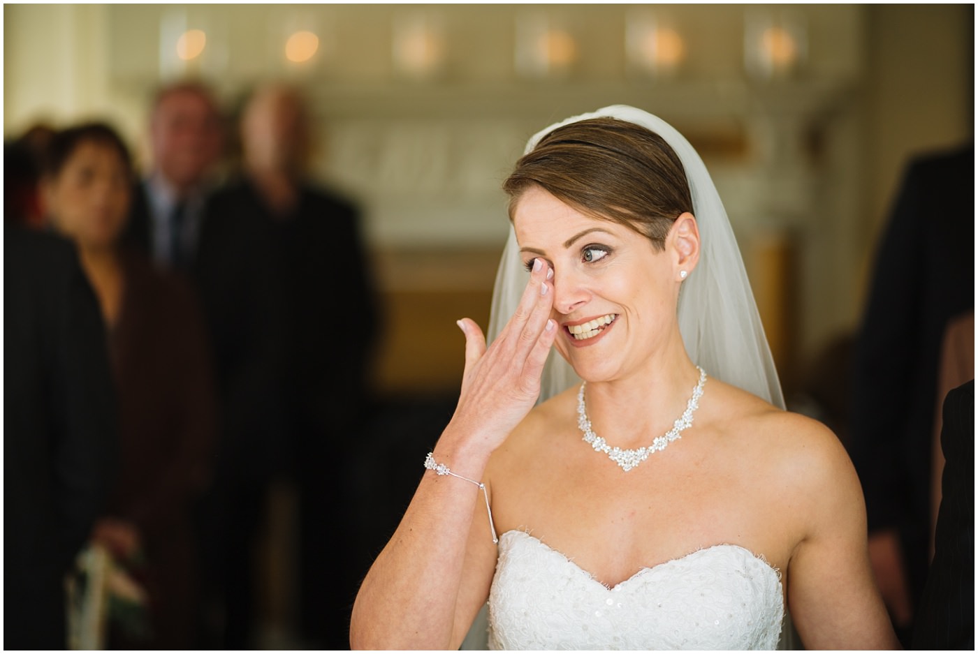 Emotional Bride during Eaves Hall Wedding Ceremony