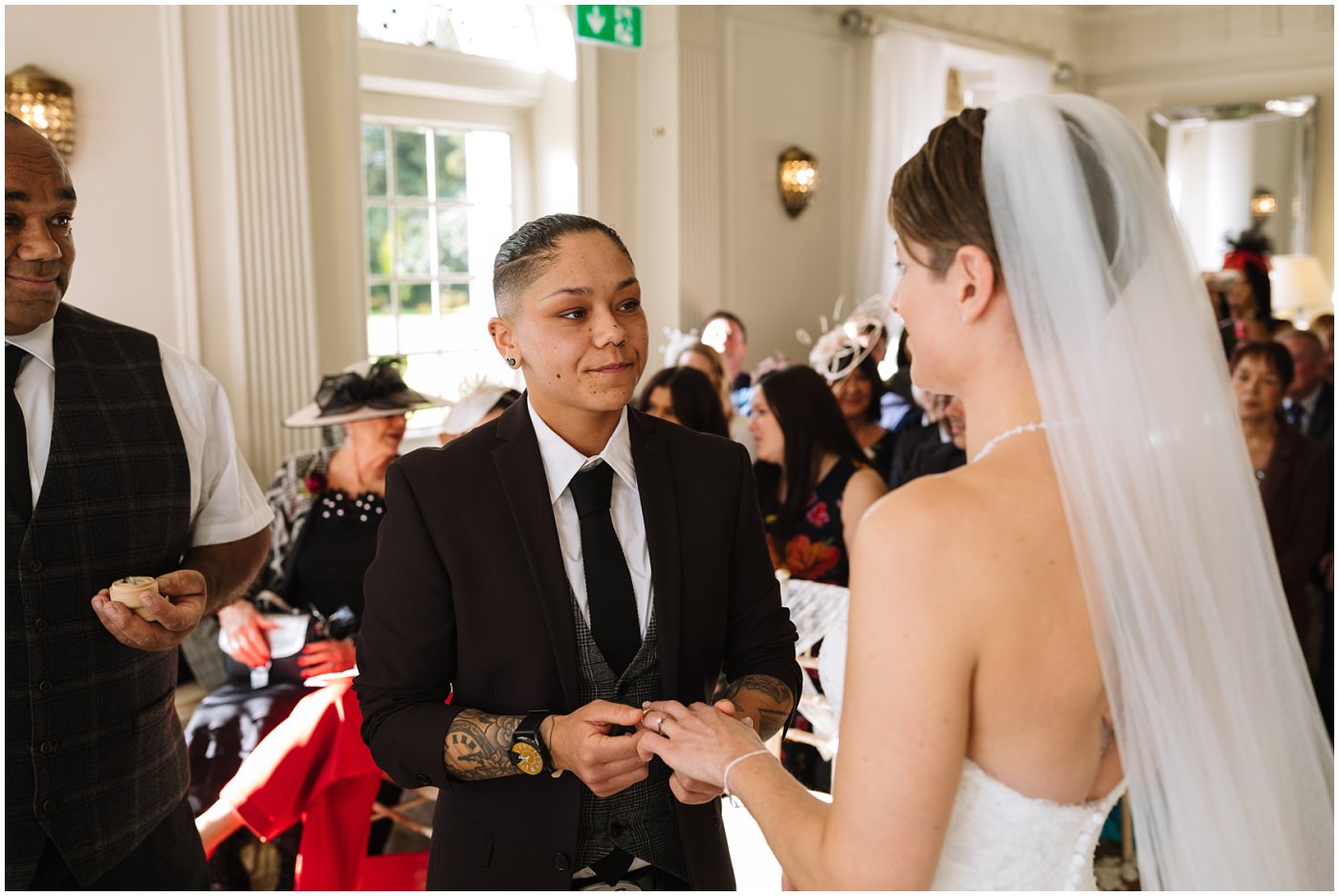 Exchange of wedding rings at Eaves Hall Wedding Ceremony