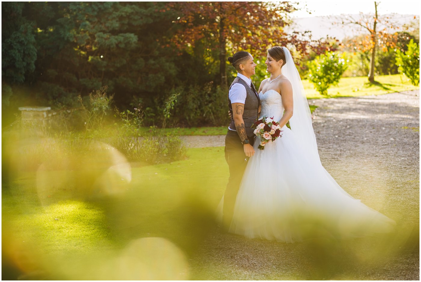 Two brides in the grounds at Eaves Hall