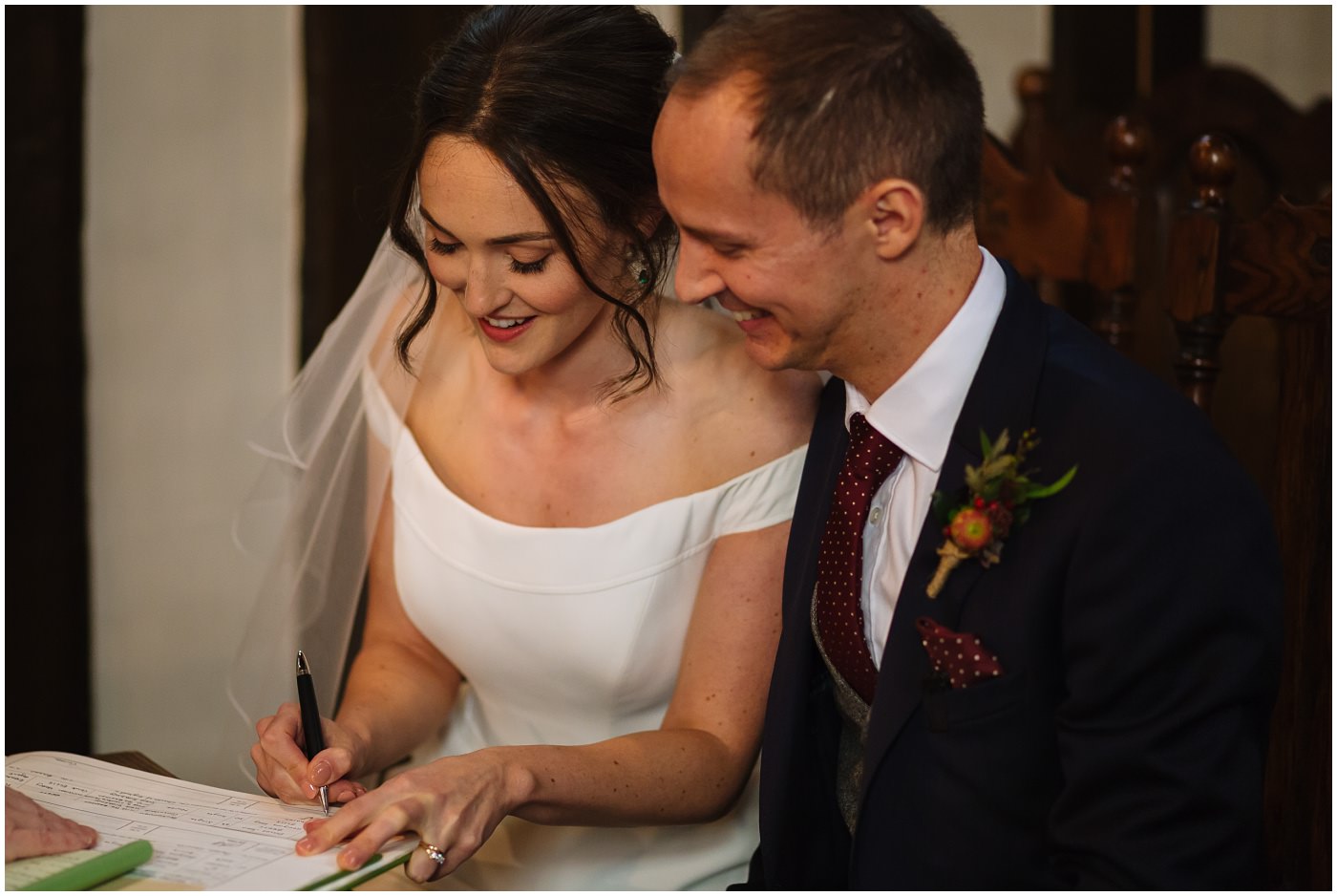 signing of the register at cheshire wedding